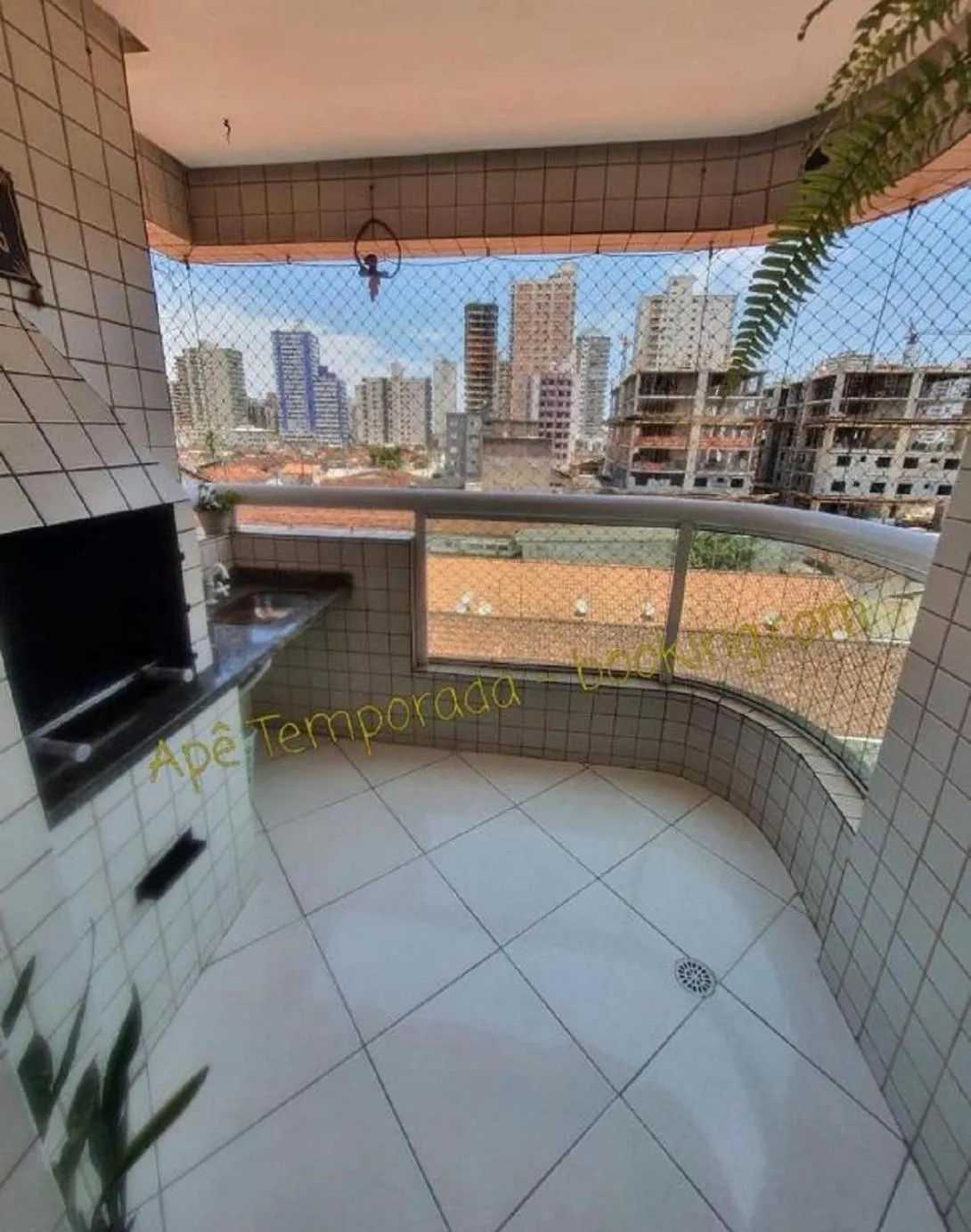 BBQ facilities in Apê Temporada Praia Grande SP Completo com Piscina, Churrasqueira, Estacionamento