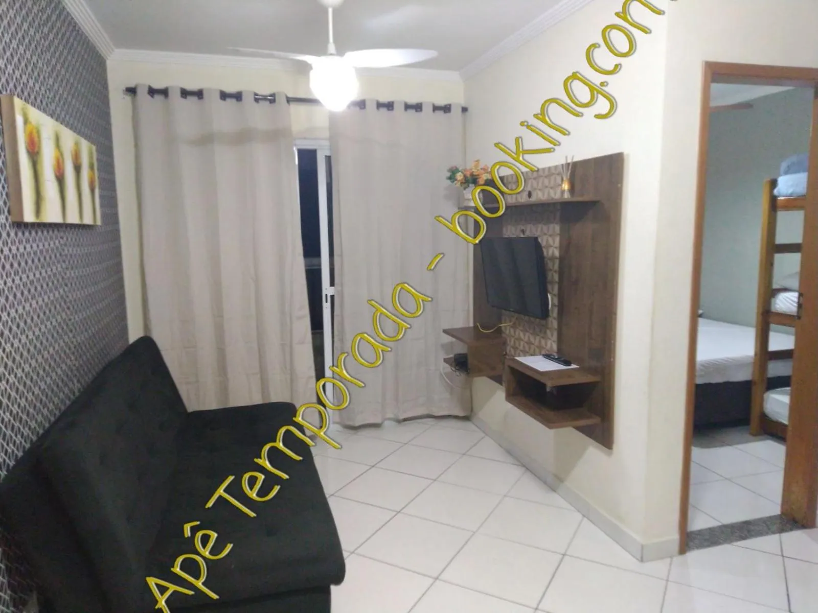 TV and multimedia in Apê Temporada Praia Grande SP Completo com Piscina, Churrasqueira, Estacionamento