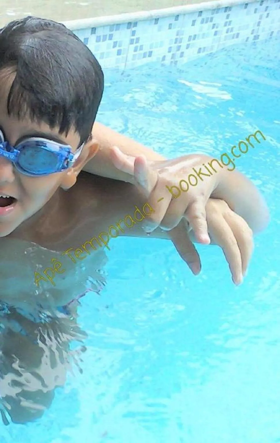 Swimming pool in Apê Temporada Praia Grande SP Completo com Piscina, Churrasqueira, Estacionamento