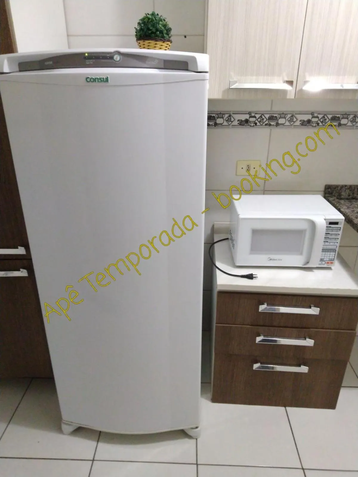 Kitchen or kitchenette in Apê Temporada Praia Grande SP Completo com Piscina, Churrasqueira, Estacionamento