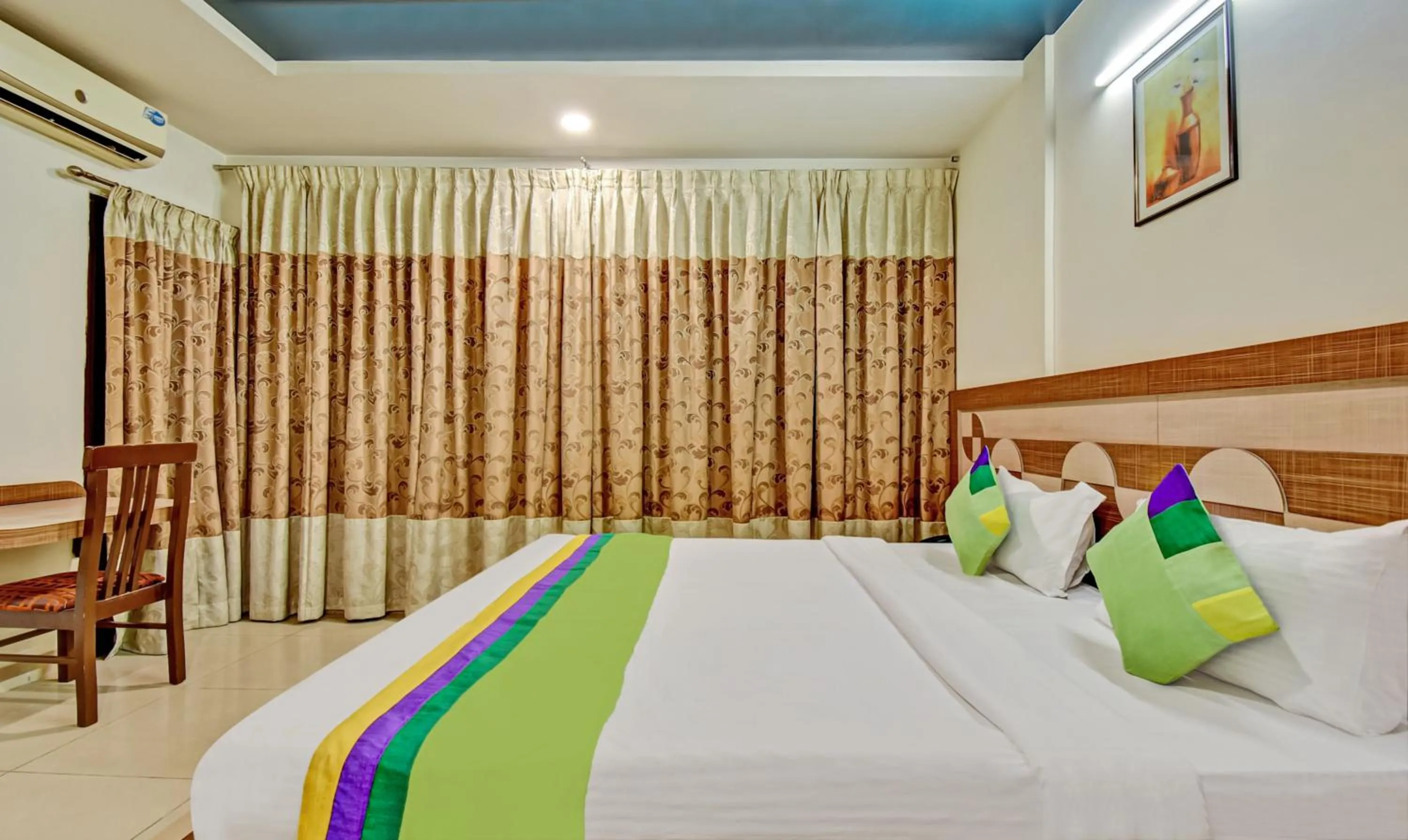 Bedroom, Bed in Treebo Raj Elegance Manyata Tech Park