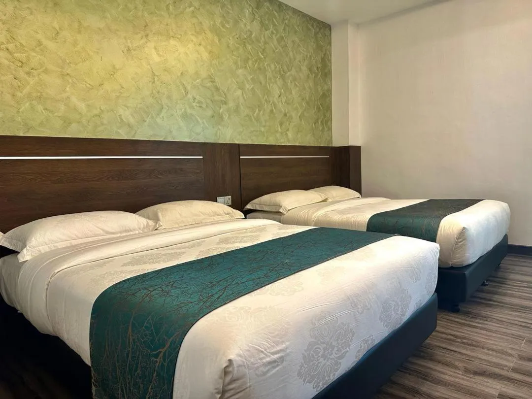 Bed in Malibest Resort