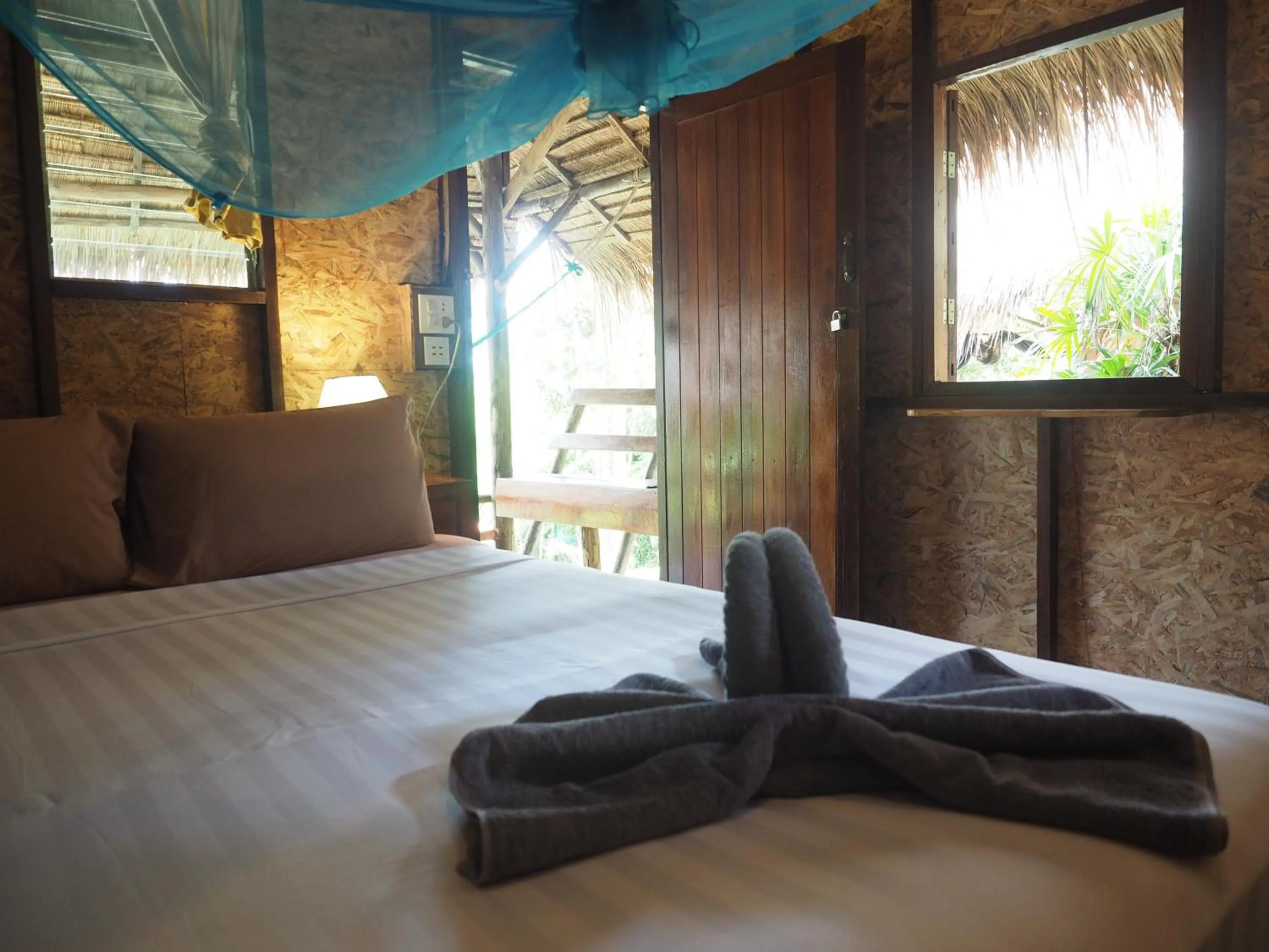 Bed in LITTLE EDEN Bungalows