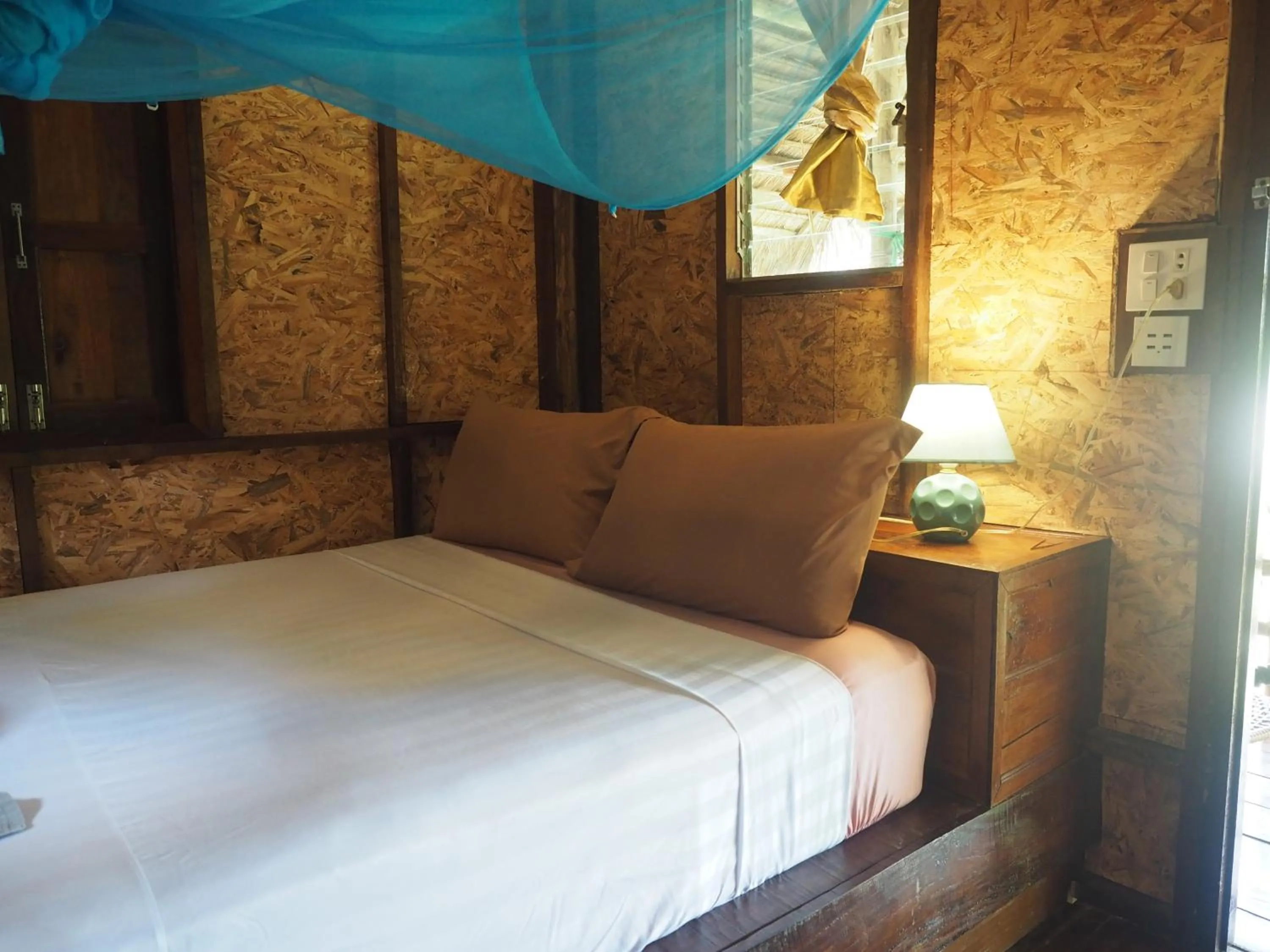 Bed in LITTLE EDEN Bungalows