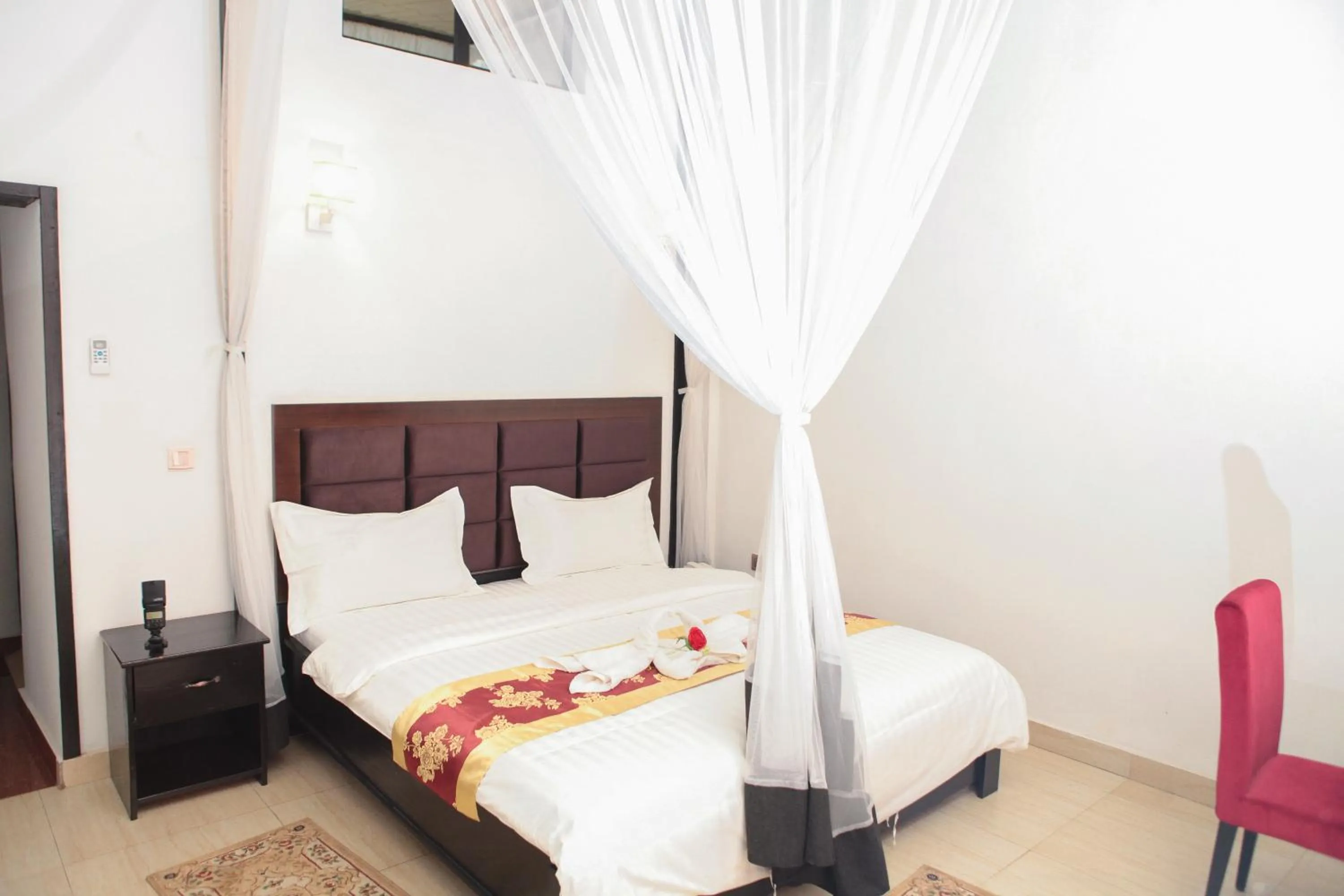 Bed in Hotel Kangaroo Bujumbura