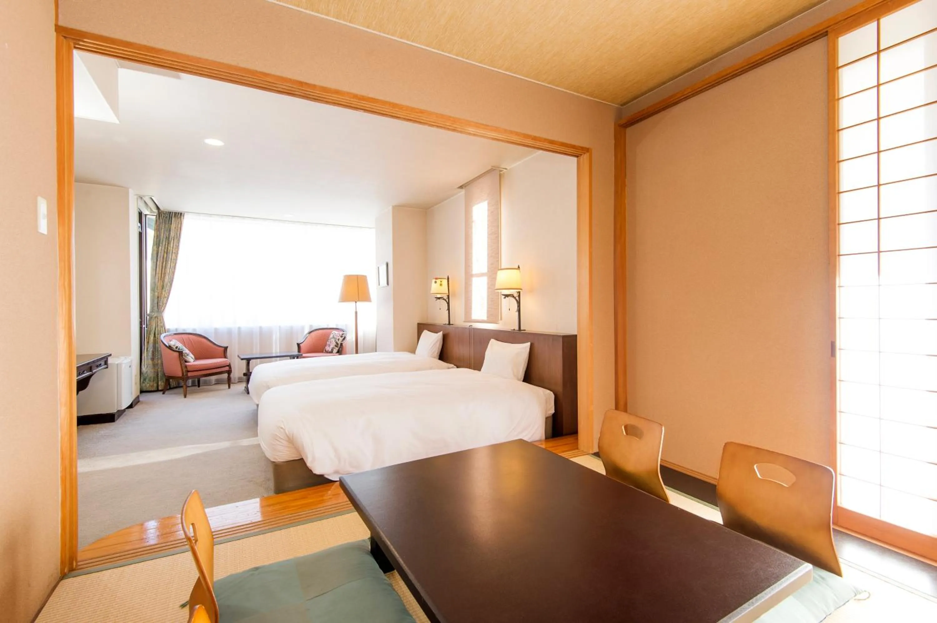 Bed in Hakuba Mominoki Hotel