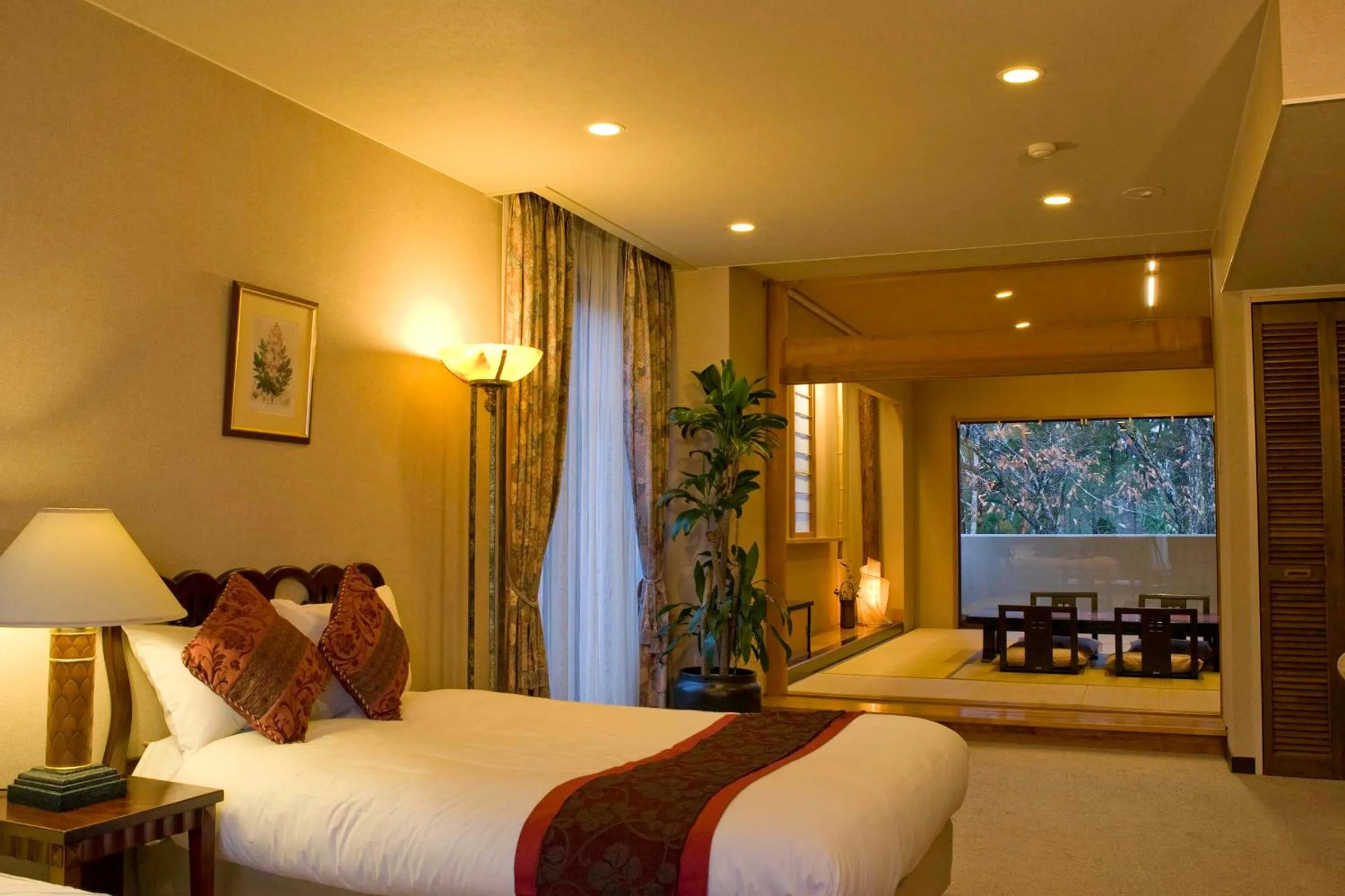 Bed in Hakuba Mominoki Hotel