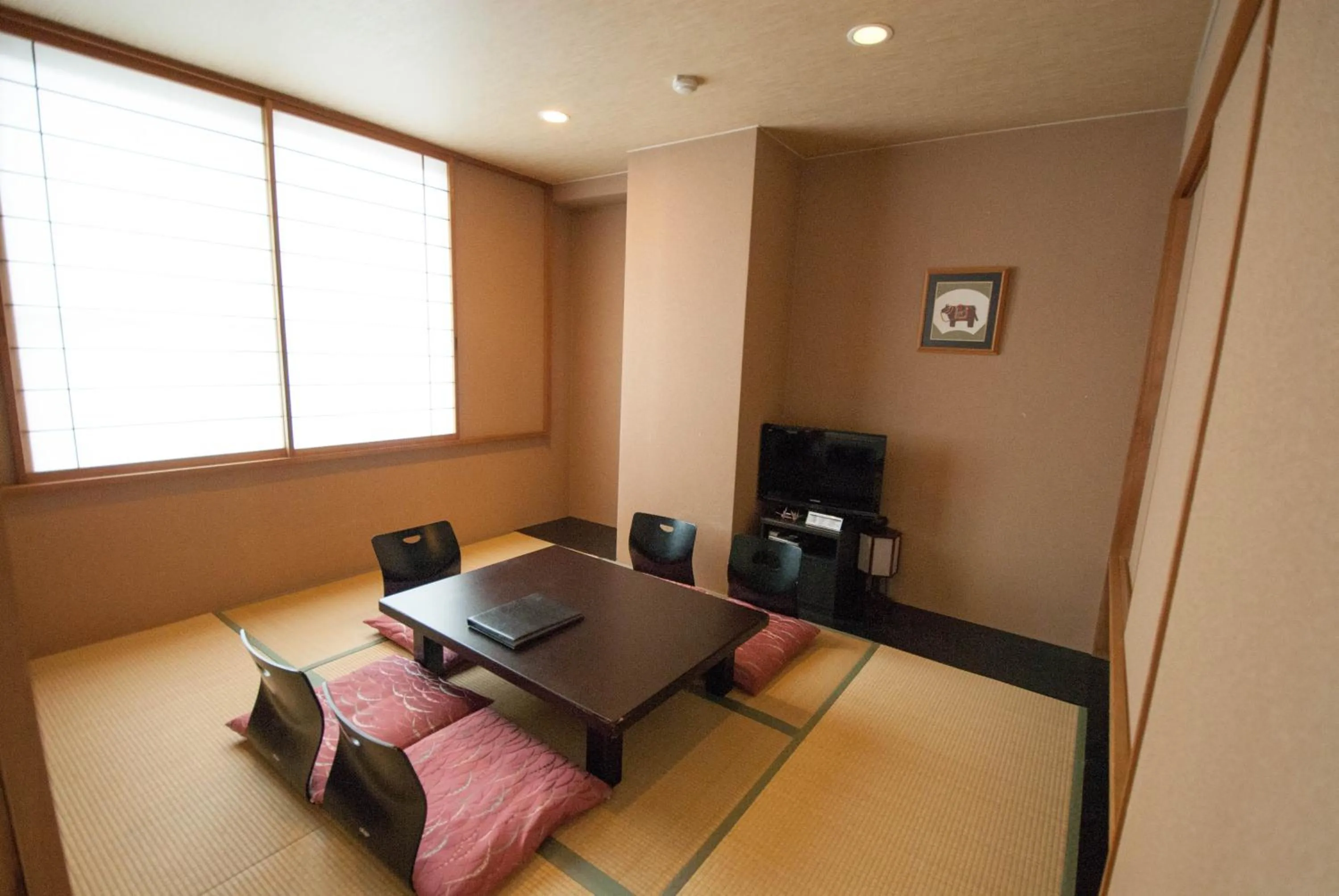 Living room, Bed in Hakuba Mominoki Hotel