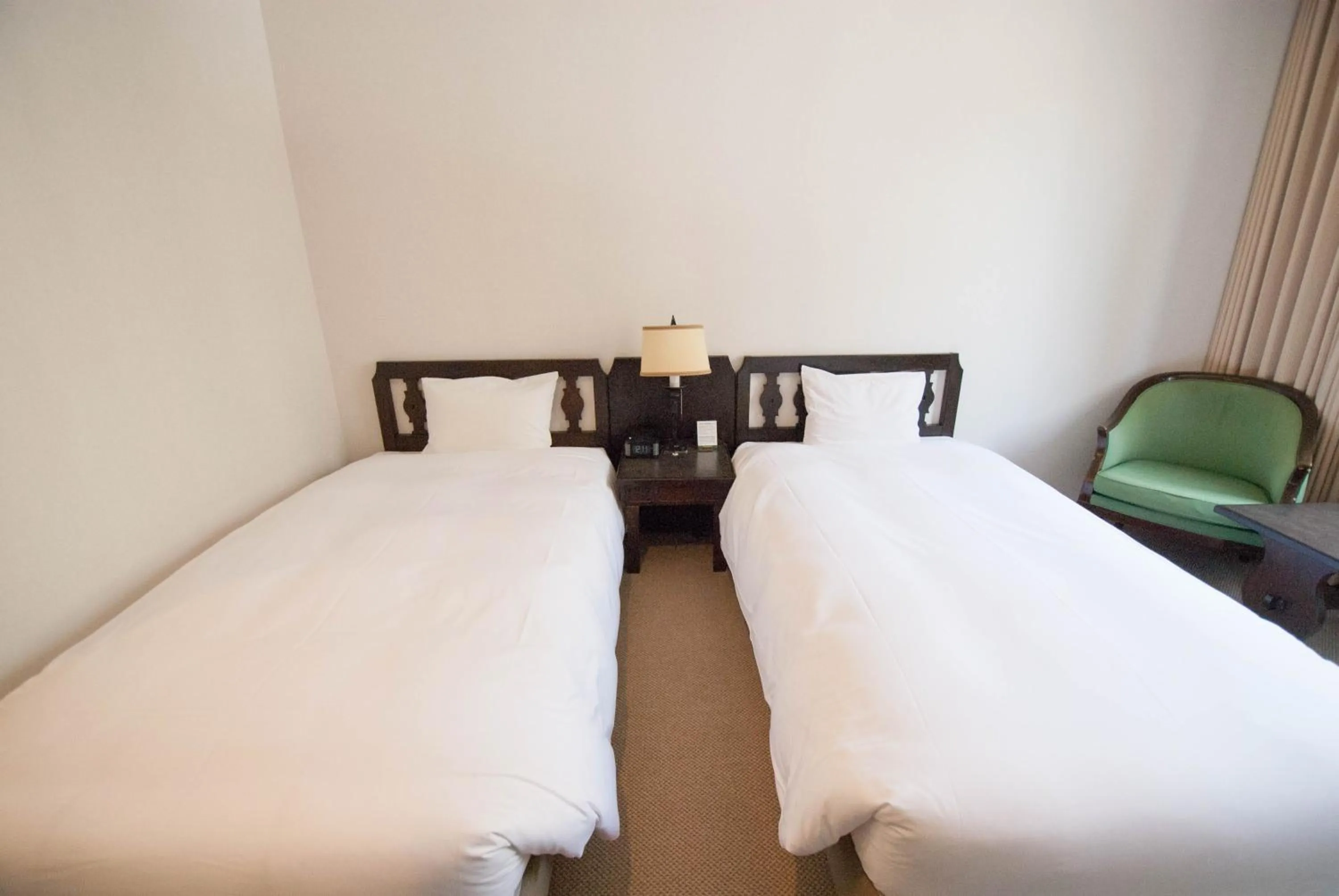 Bed in Hakuba Mominoki Hotel