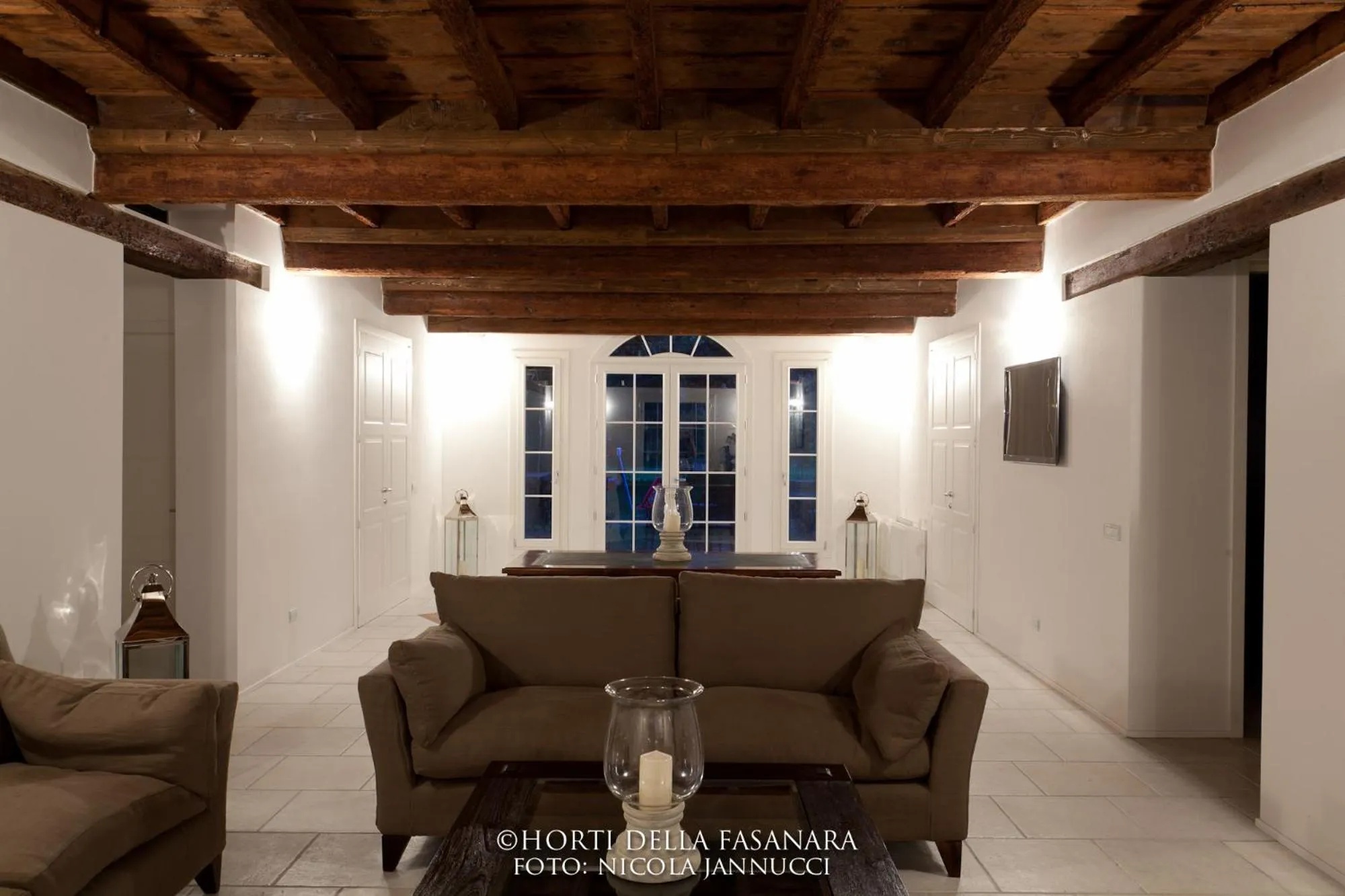 Communal lounge/ TV room in Horti Della Fasanara