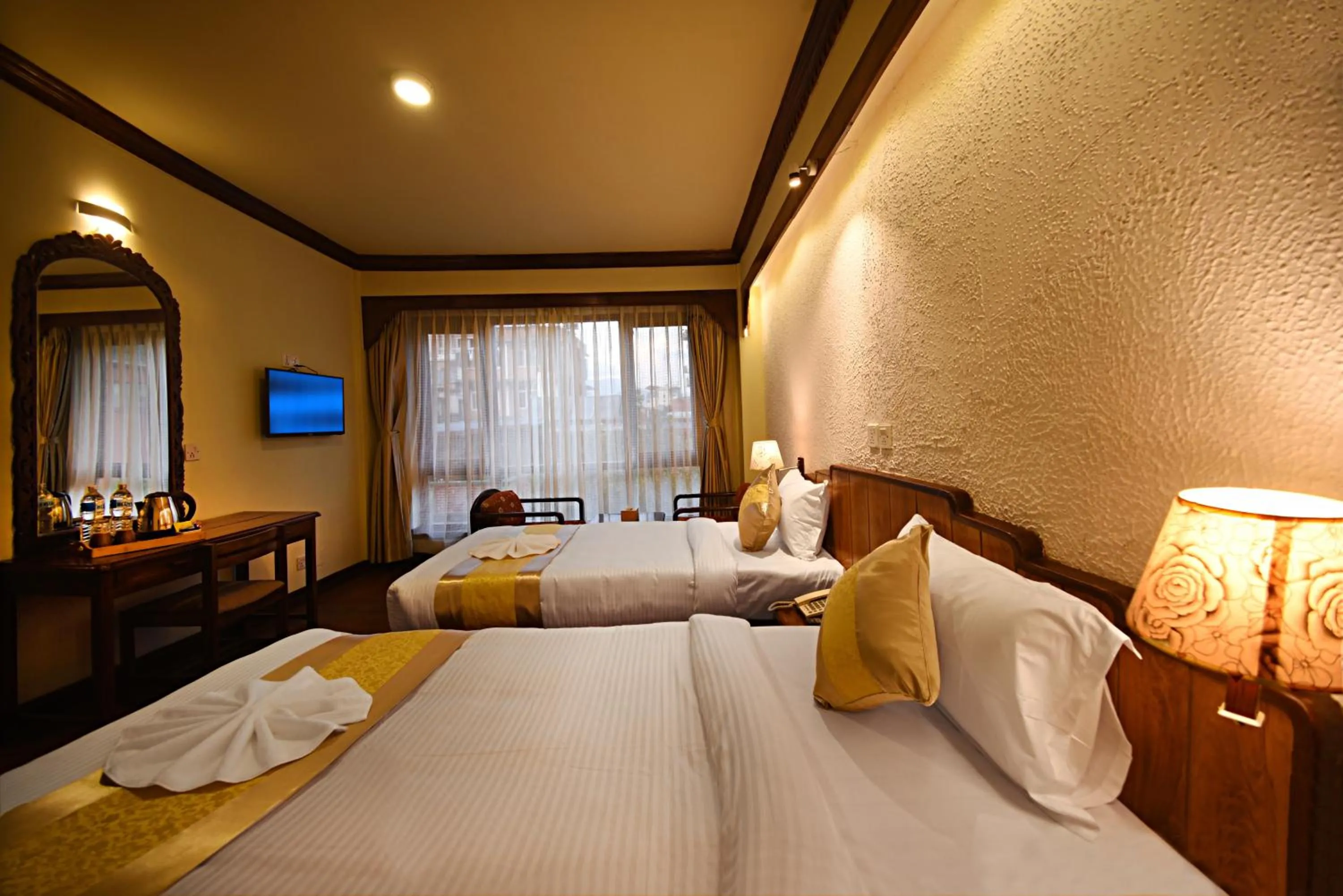 Bed in Nirvana Boutique Hotel