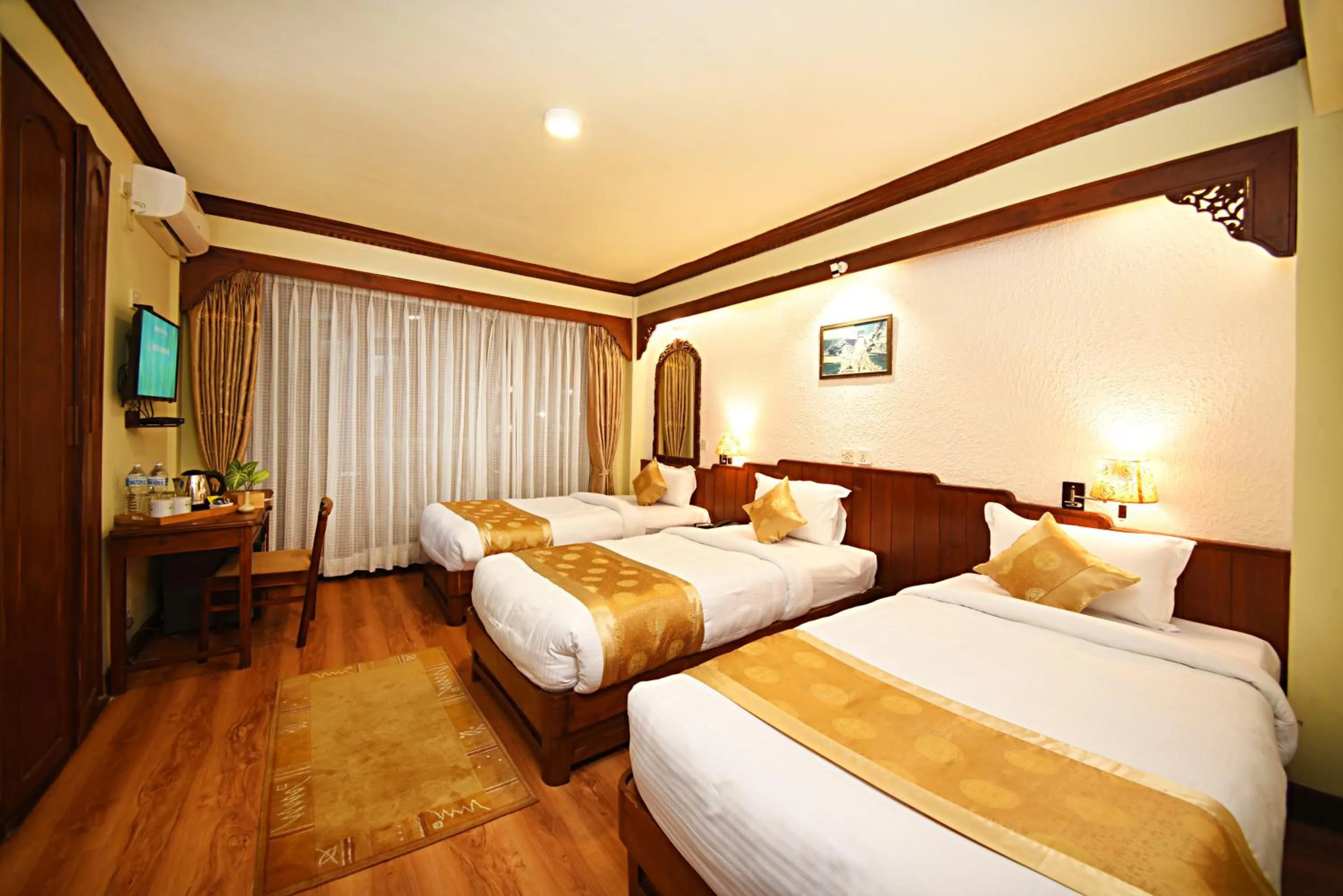 Bed in Nirvana Boutique Hotel