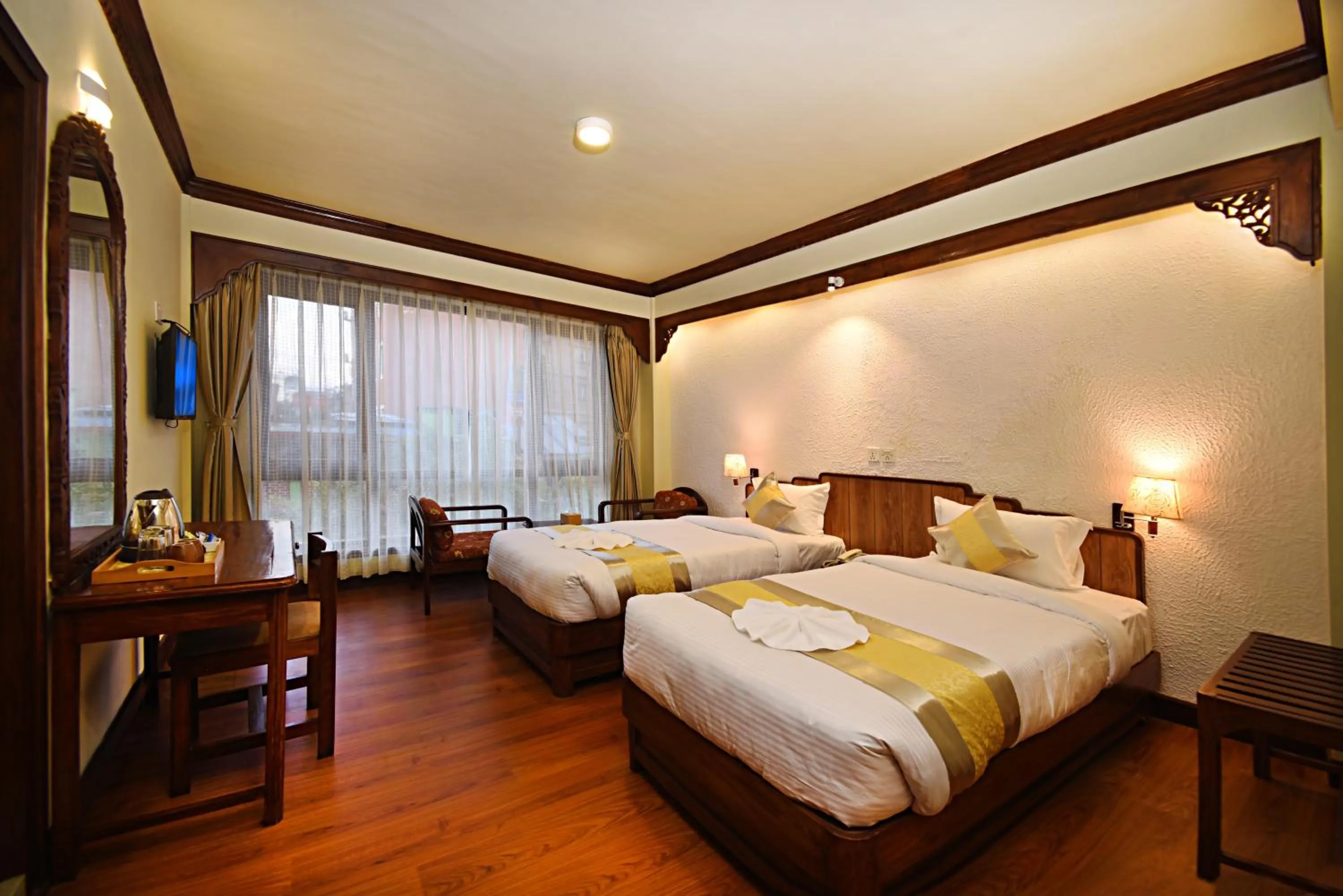 Bed in Nirvana Boutique Hotel
