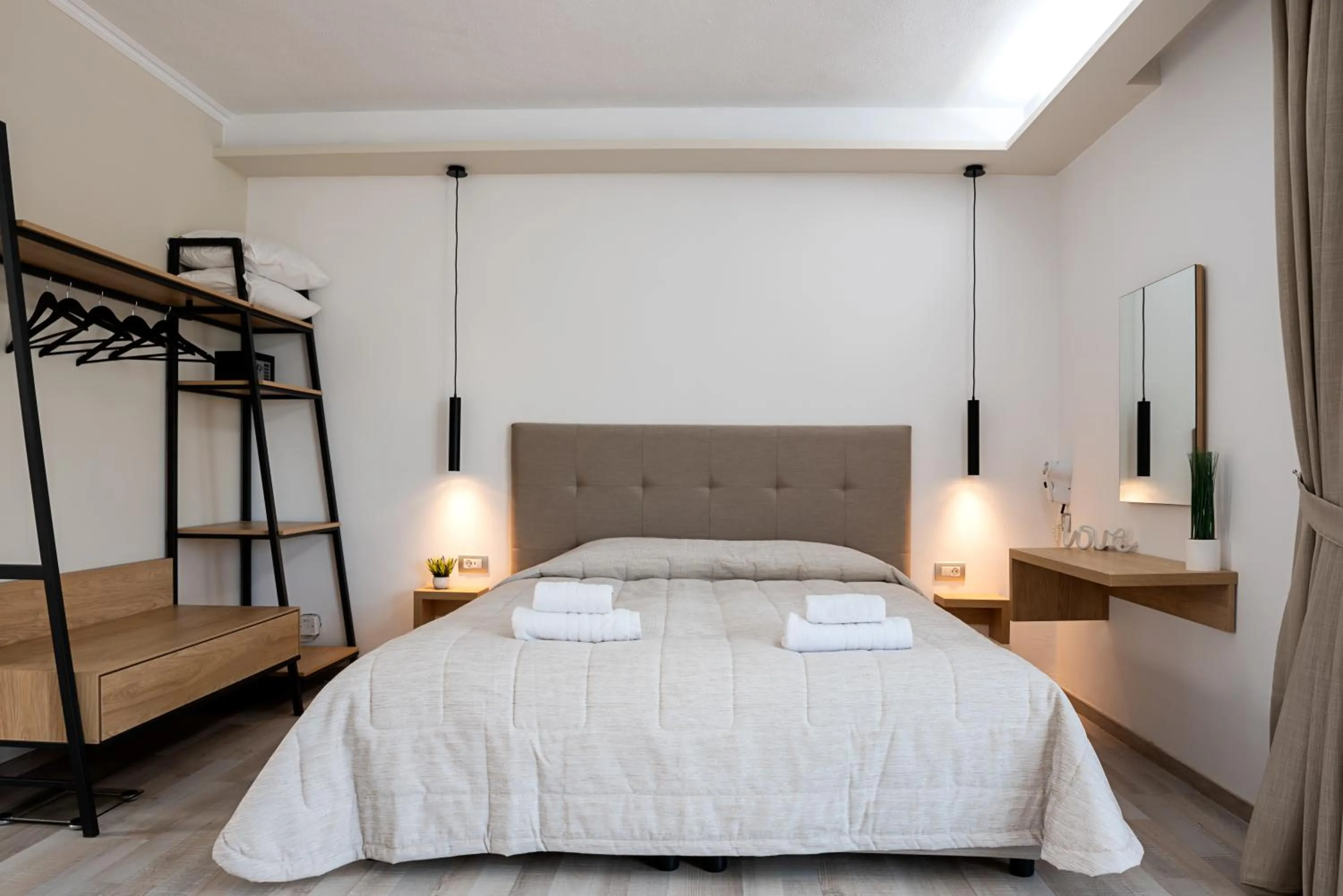 Bed in Terinikos Sunny Garden Hotel & Junior Suites