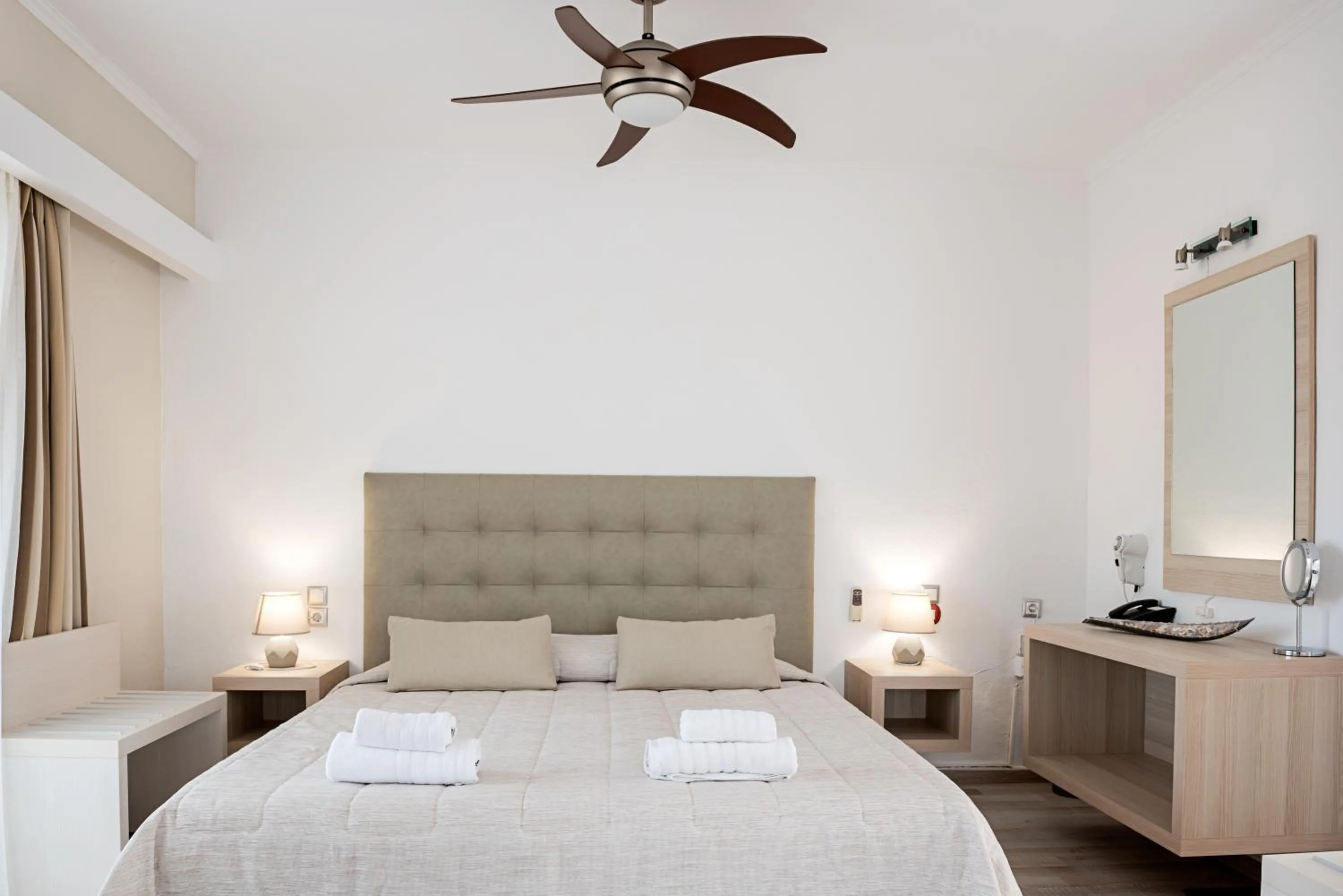 Bed in Terinikos Sunny Garden Hotel & Junior Suites