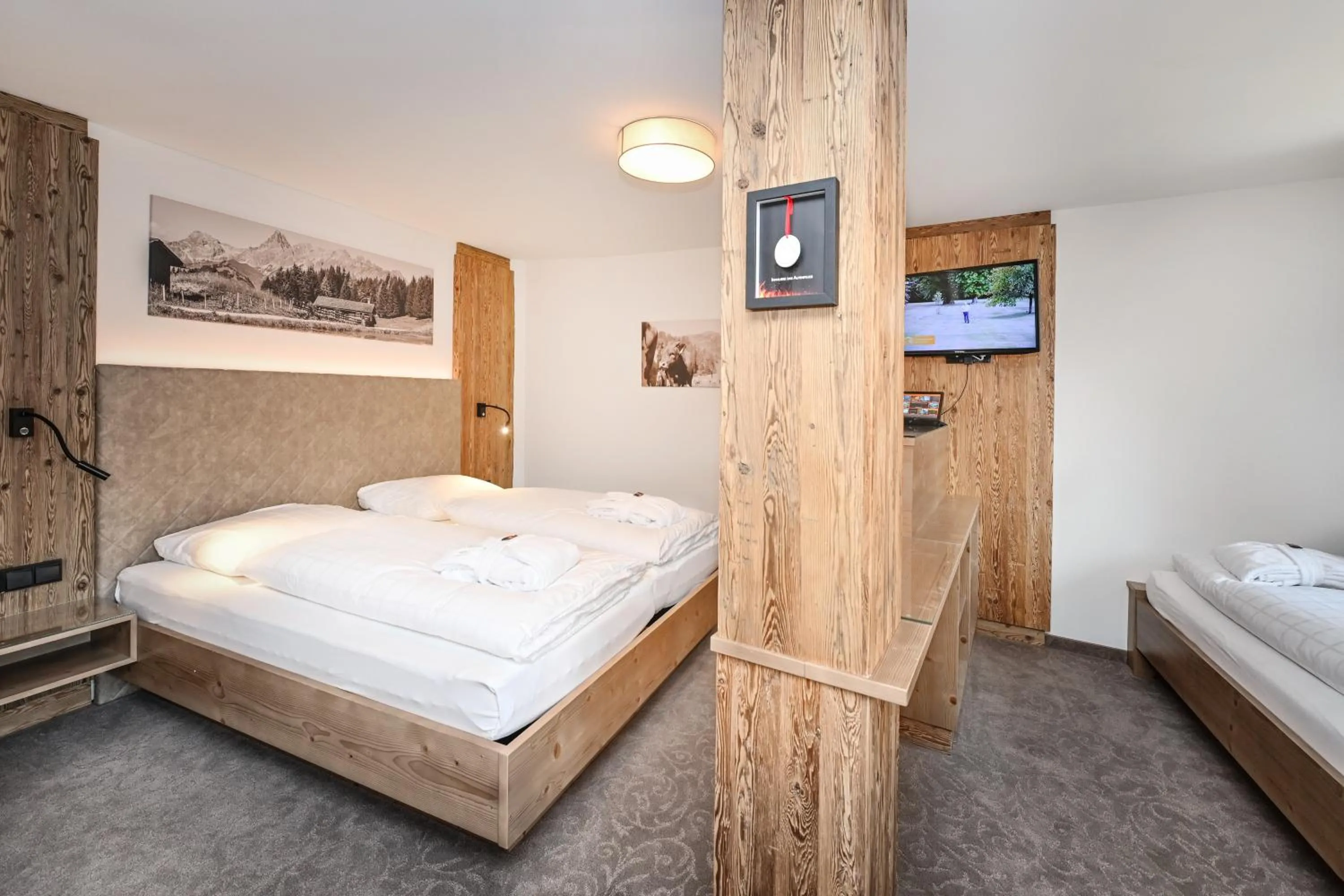 Photo of the whole room, Bed in Hotel Alpenfeuer Montafon