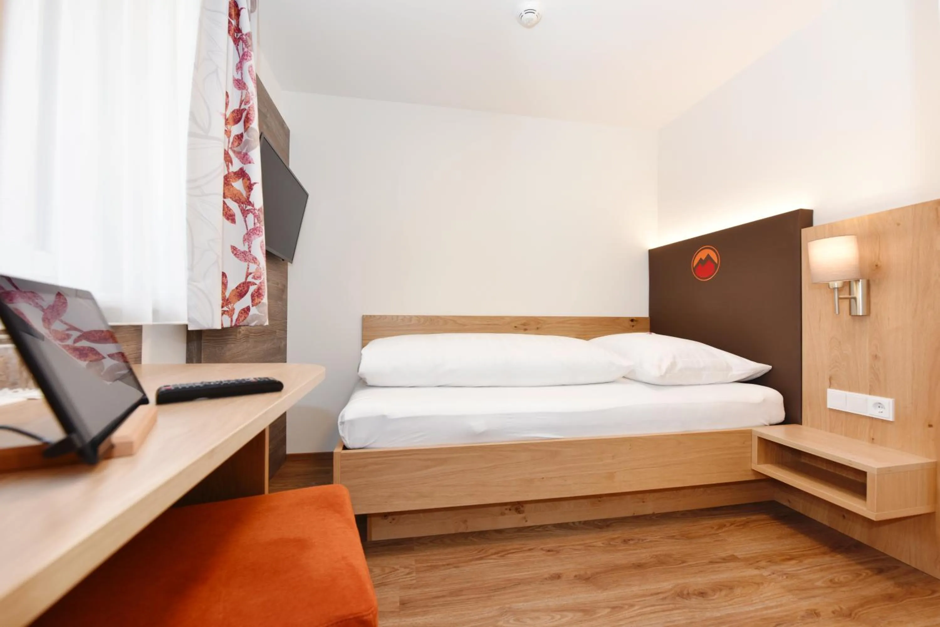 Photo of the whole room, Bed in Hotel Alpenfeuer Montafon