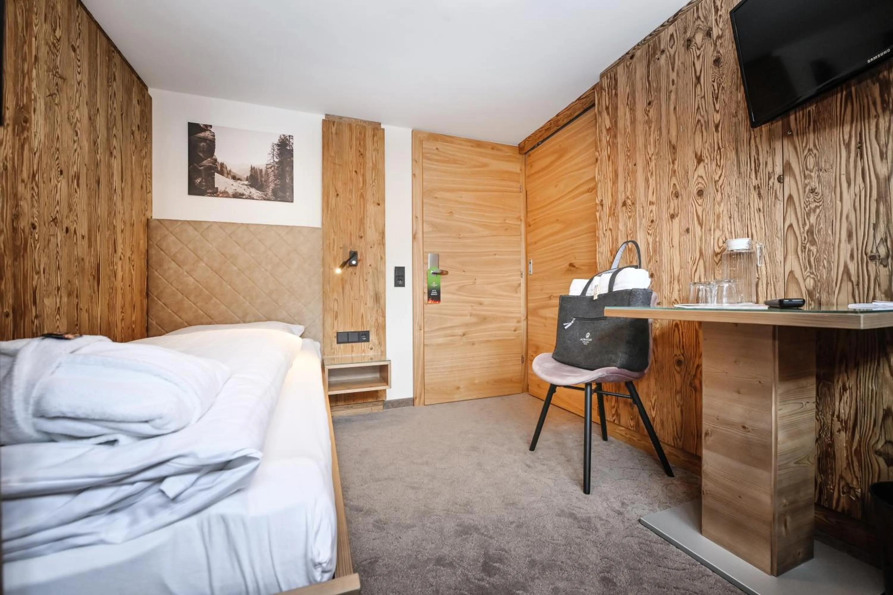 Photo of the whole room, Bed in Hotel Alpenfeuer Montafon