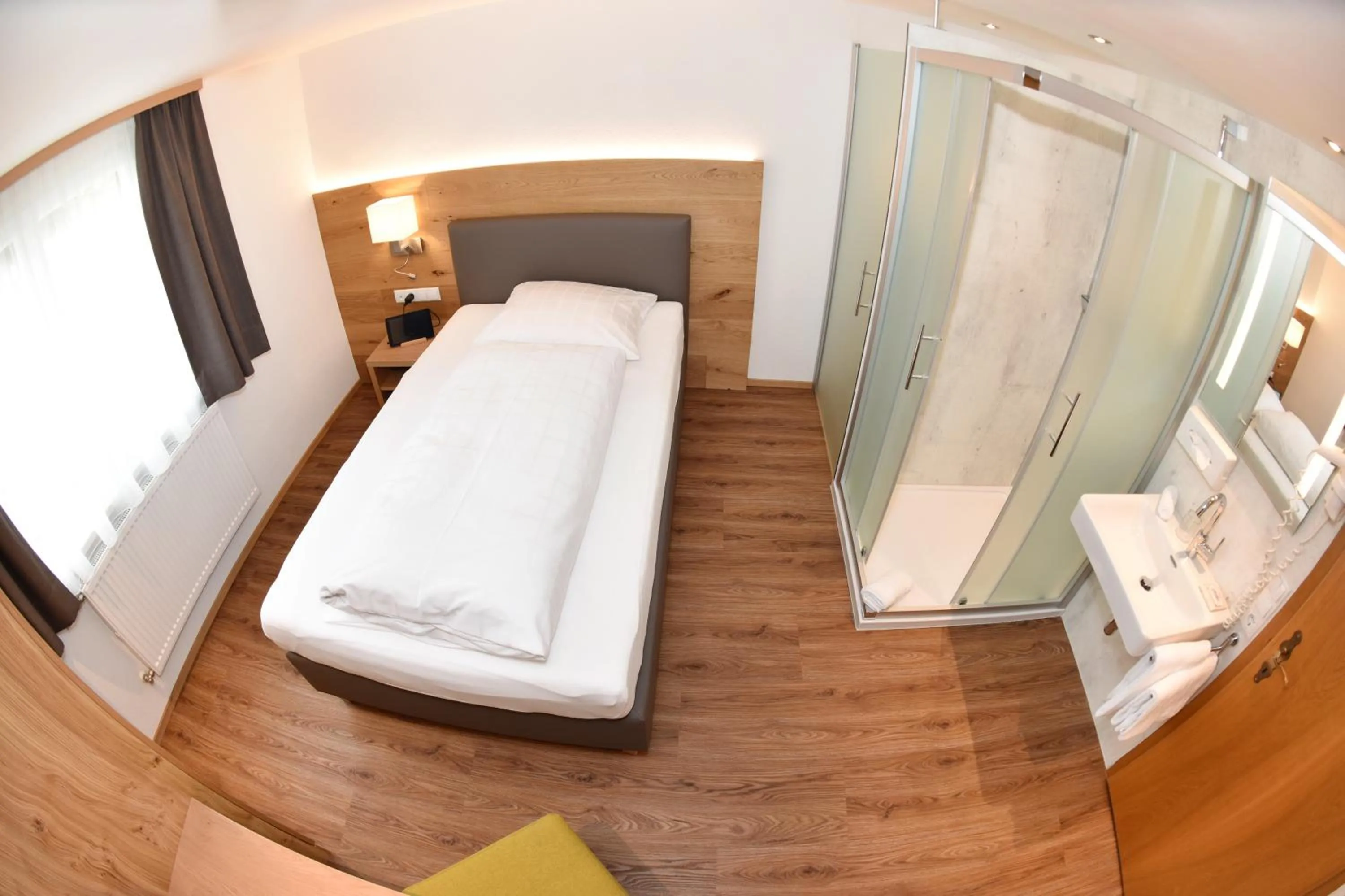 Bathroom, Bed in Hotel Alpenfeuer Montafon