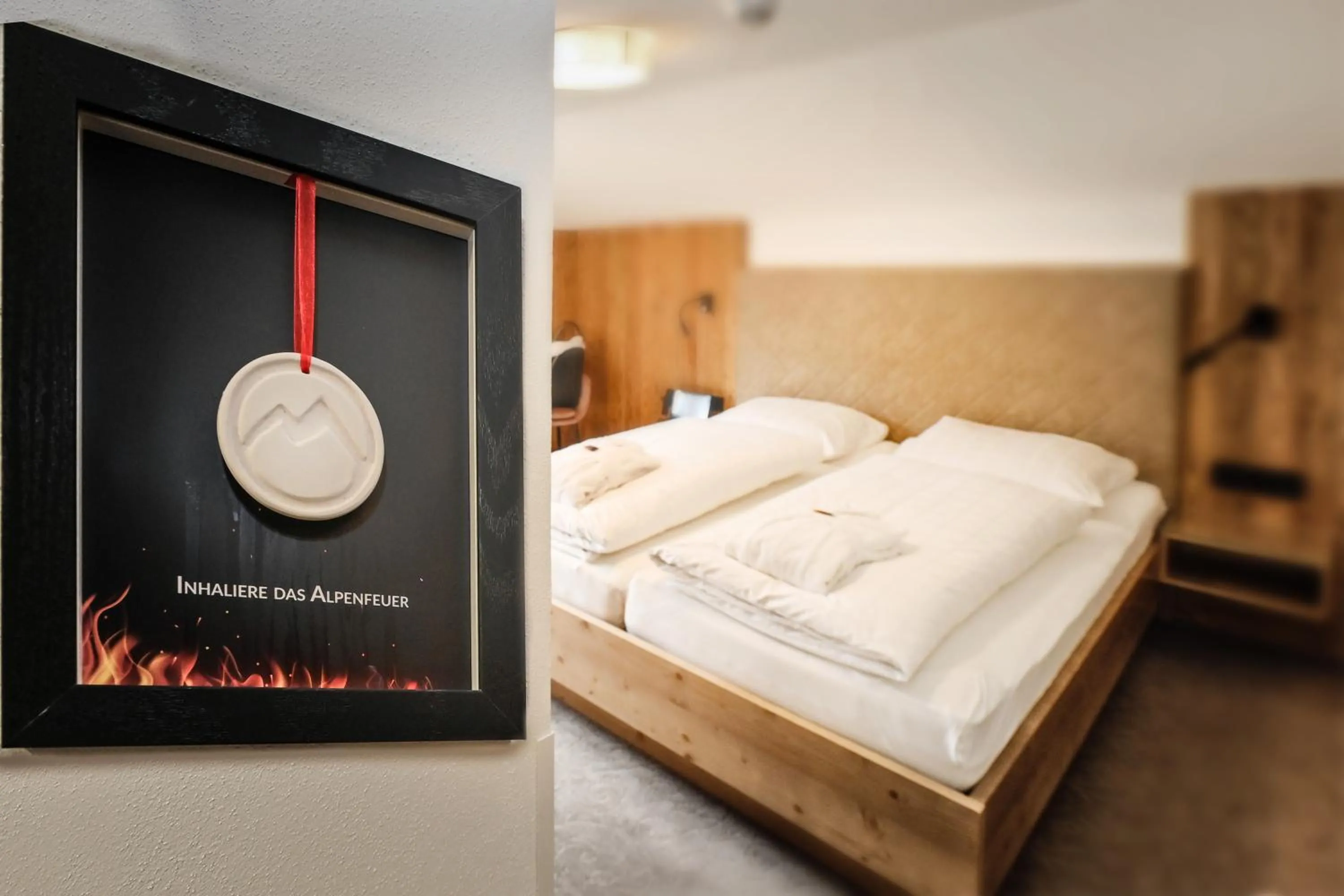 Property building, Bed in Hotel Alpenfeuer Montafon