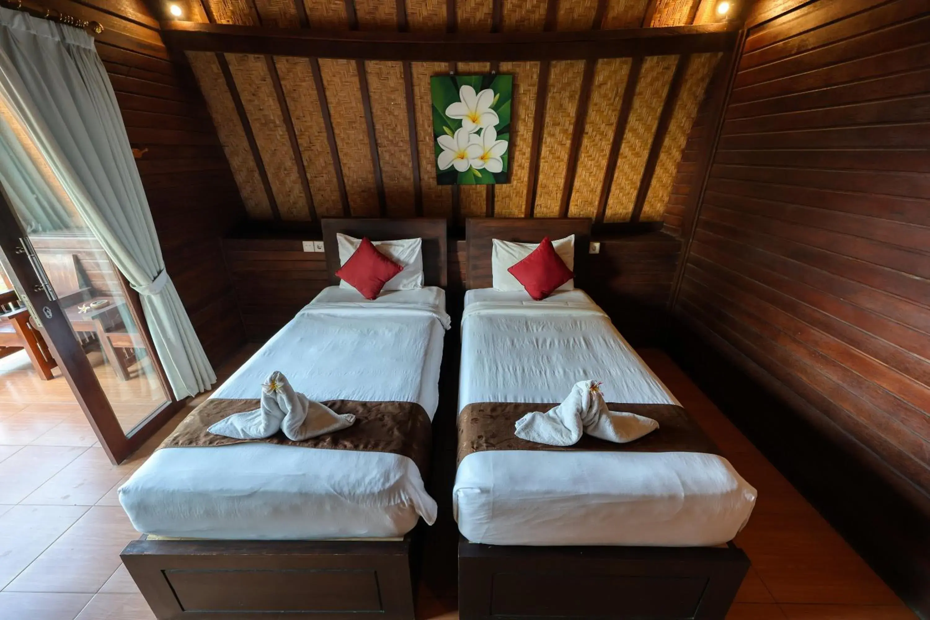 Bed in Bataran Garden Cottage Bed in Bataran Garden Cottage