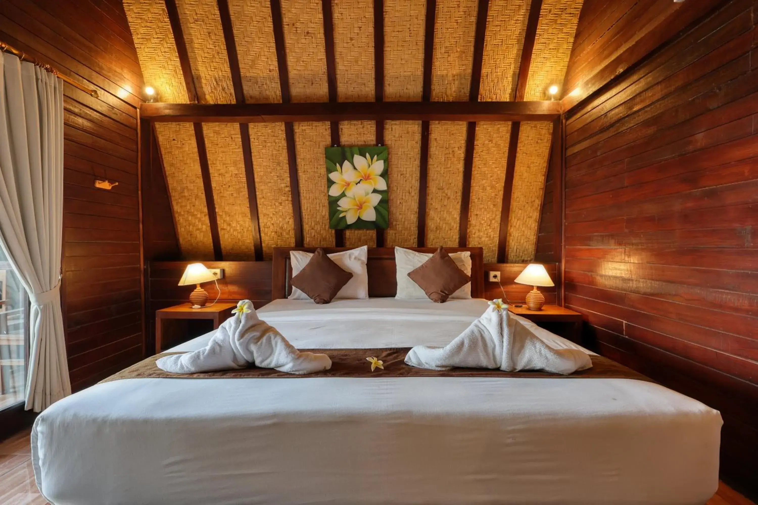 Bed in Bataran Garden Cottage Bed in Bataran Garden Cottage