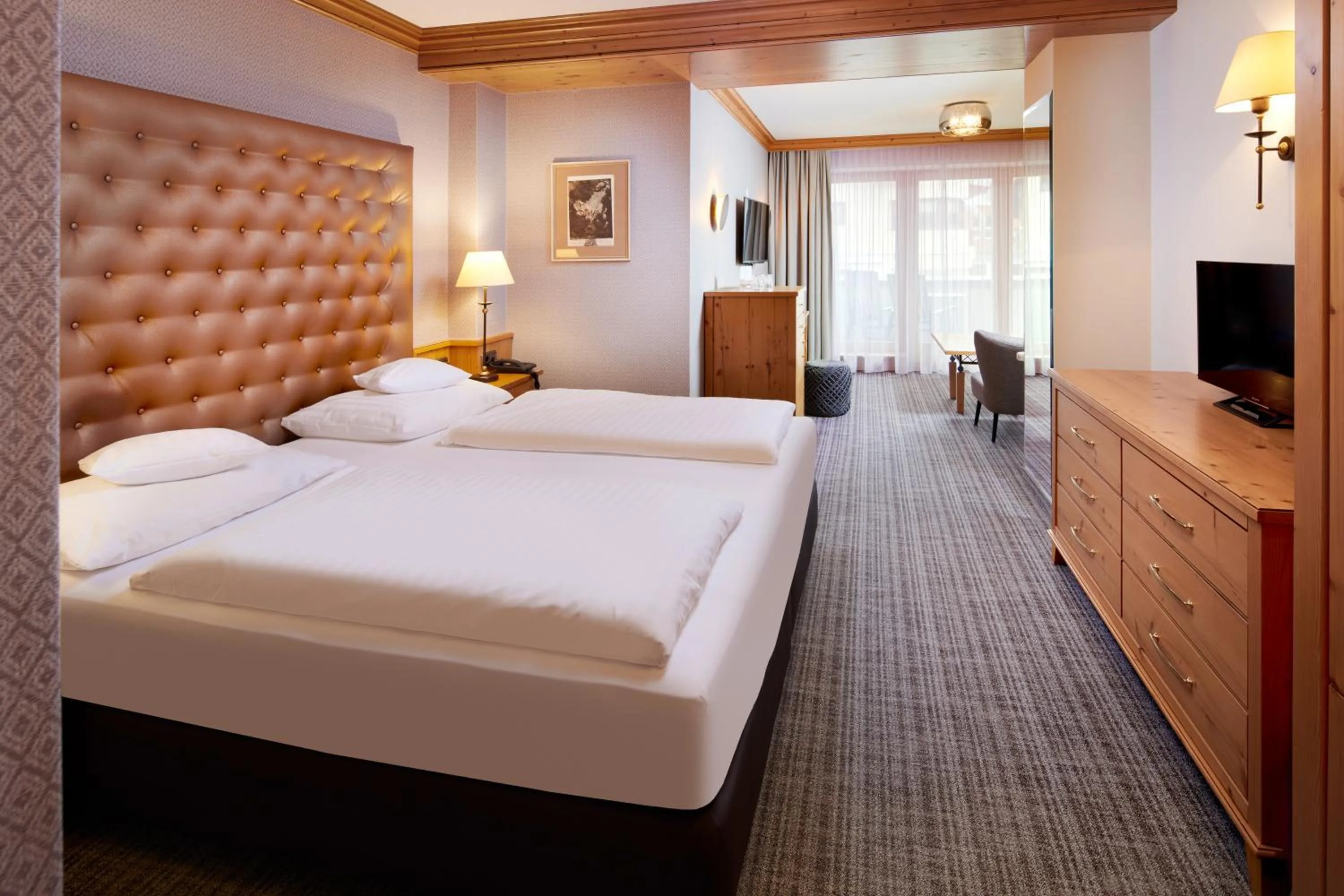 Photo of the whole room, Bed in Sporthotel Ellmau in Tirol