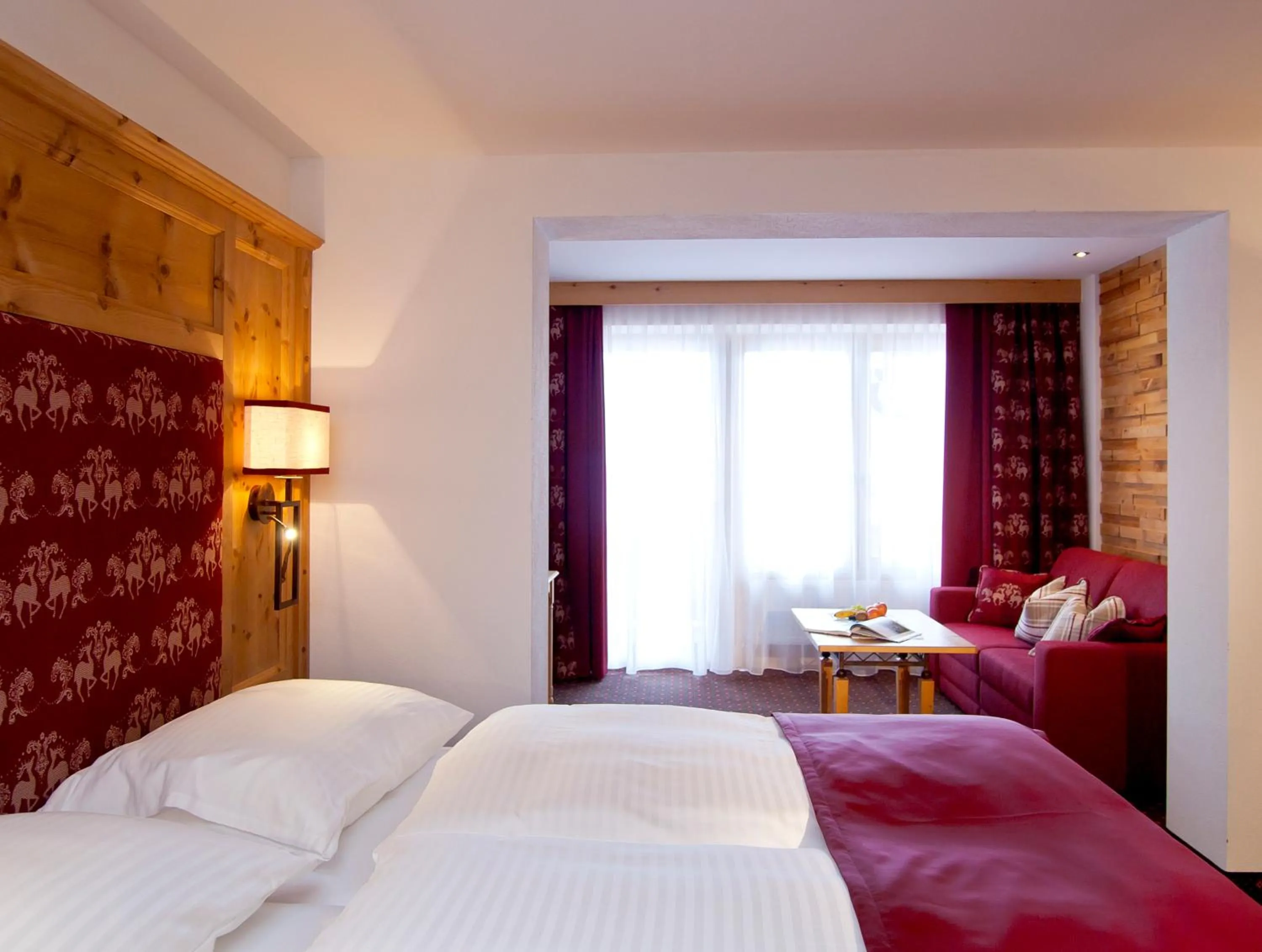 Photo of the whole room, Bed in Sporthotel Ellmau in Tirol