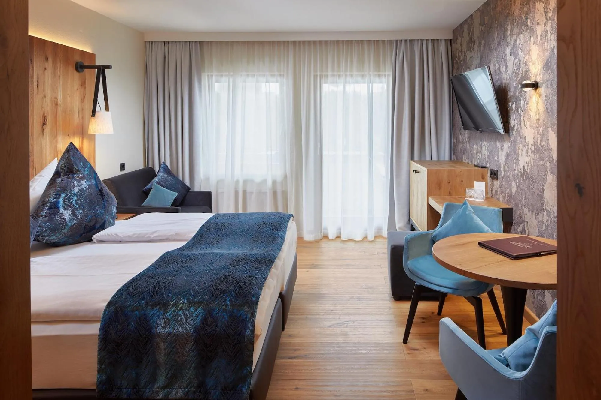 Photo of the whole room, Bed in Sporthotel Ellmau in Tirol