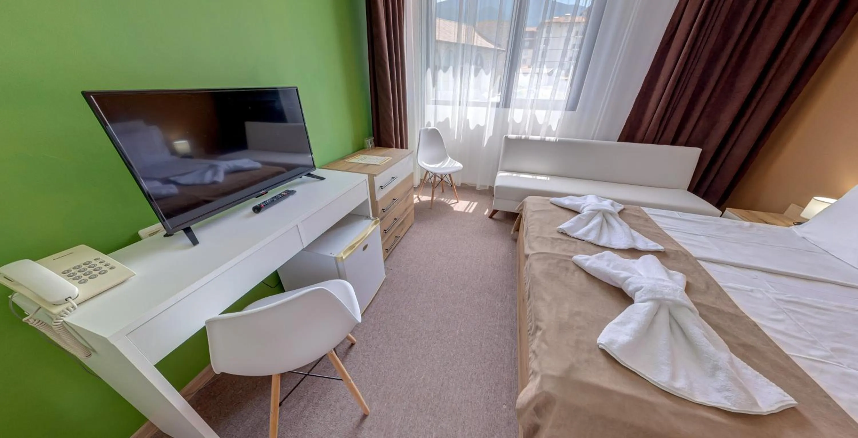 TV and multimedia, Bed in Grami Hotel