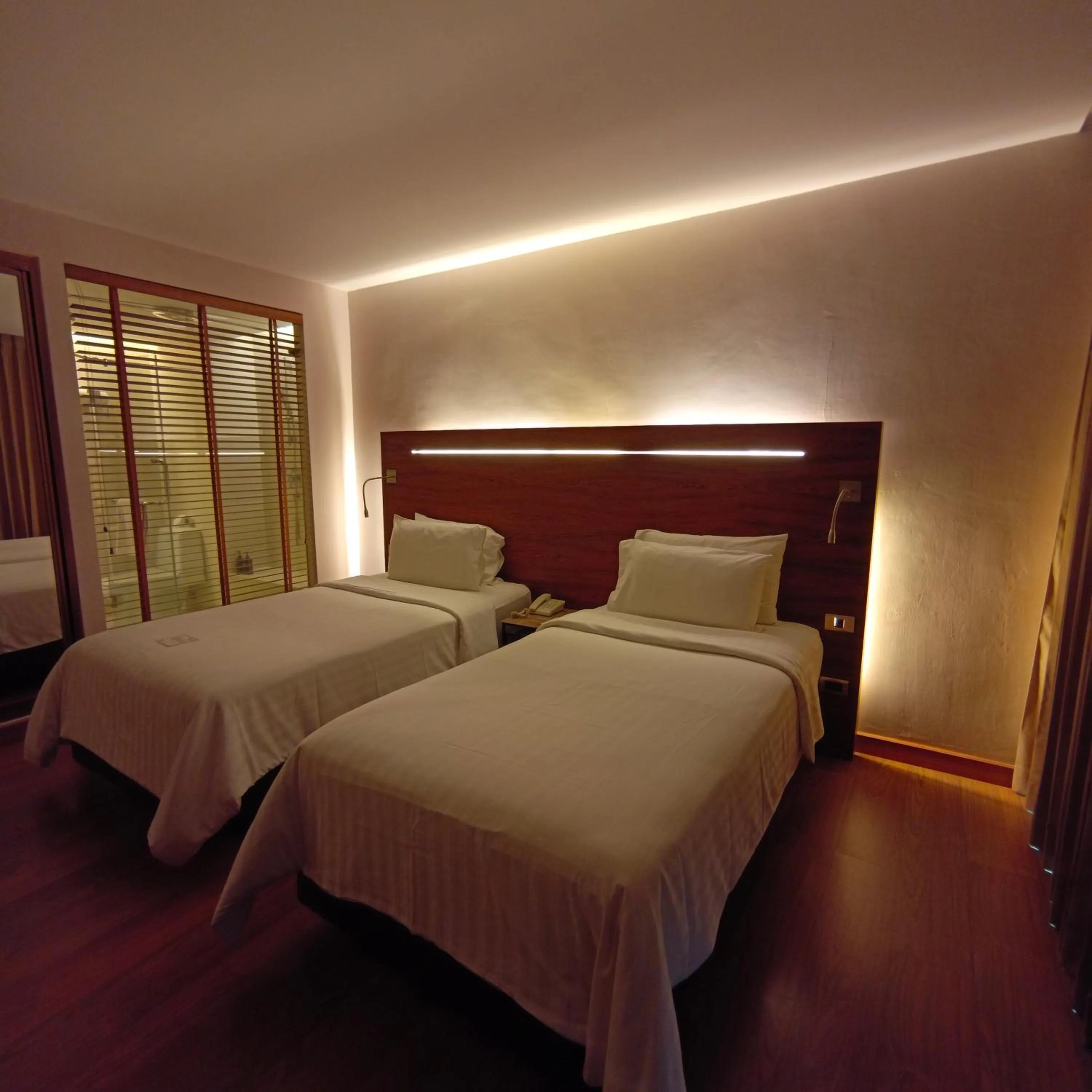 Bed in Sacha's Hotel Uno