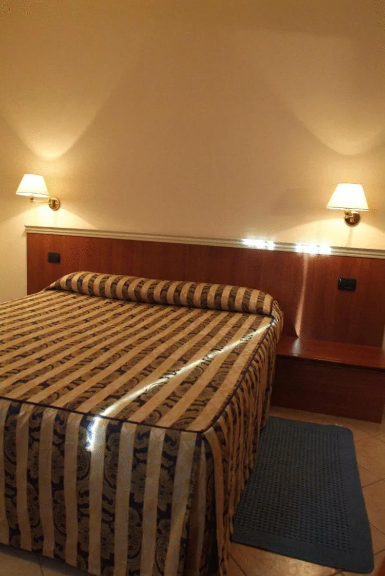 Bed in Hotel La Maddalena