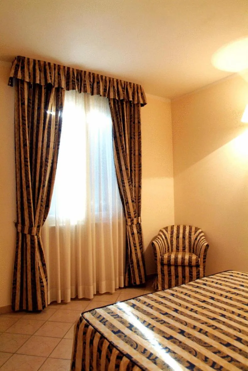 Bed in Hotel La Maddalena