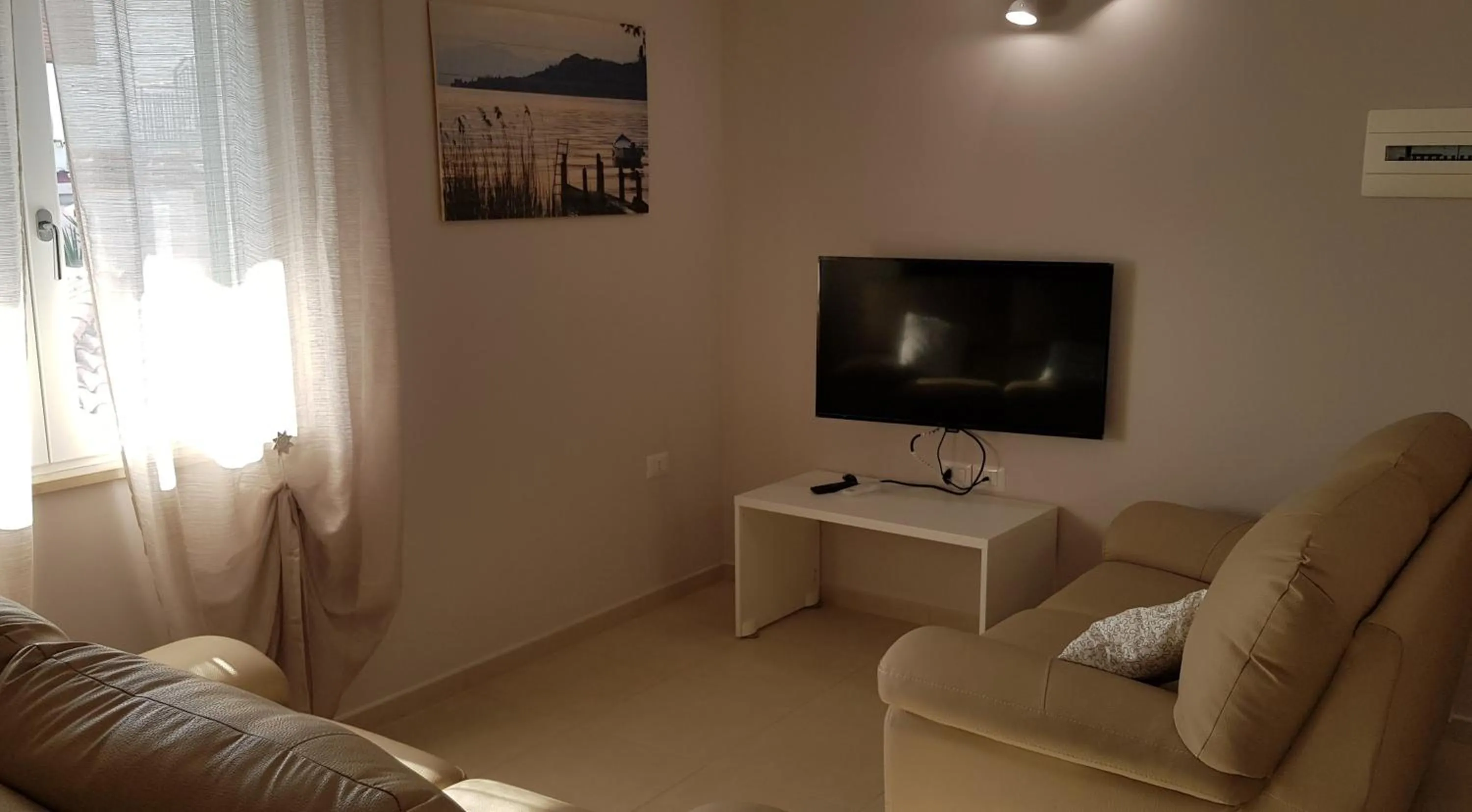 Communal lounge/ TV room in Home Sweet Home