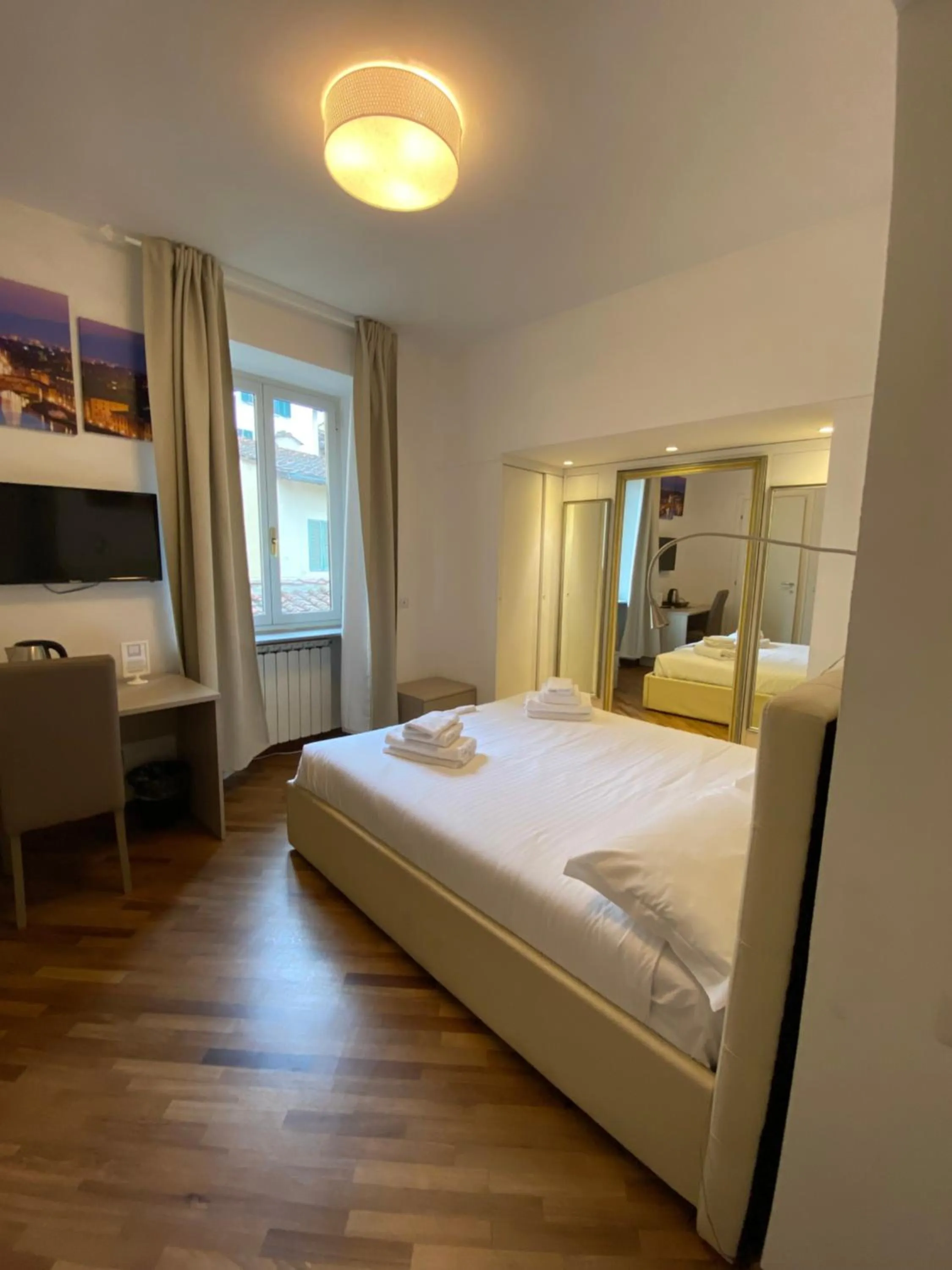 Bed in Le Tre Lune Suites