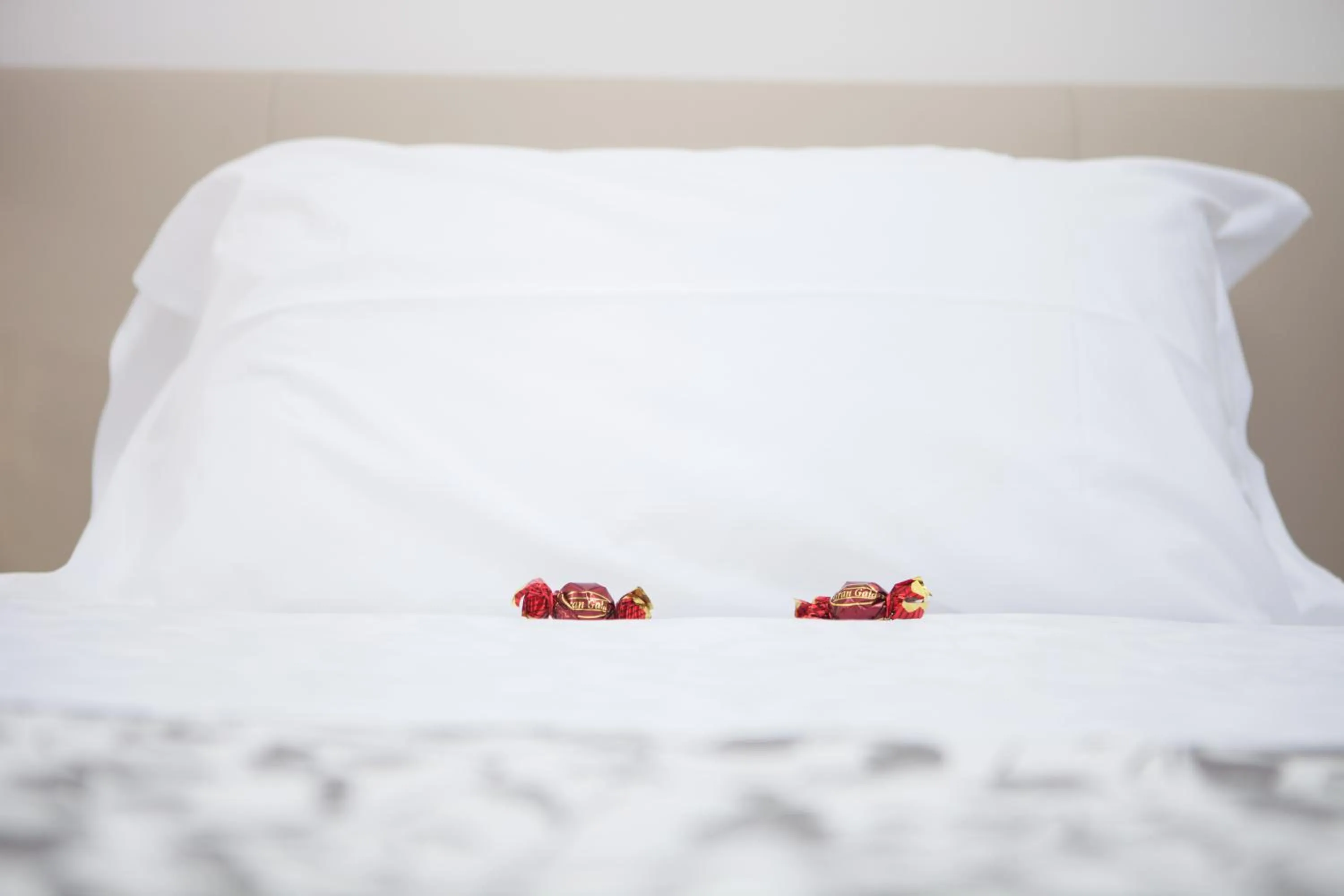 Bed in Le Tre Lune Suites