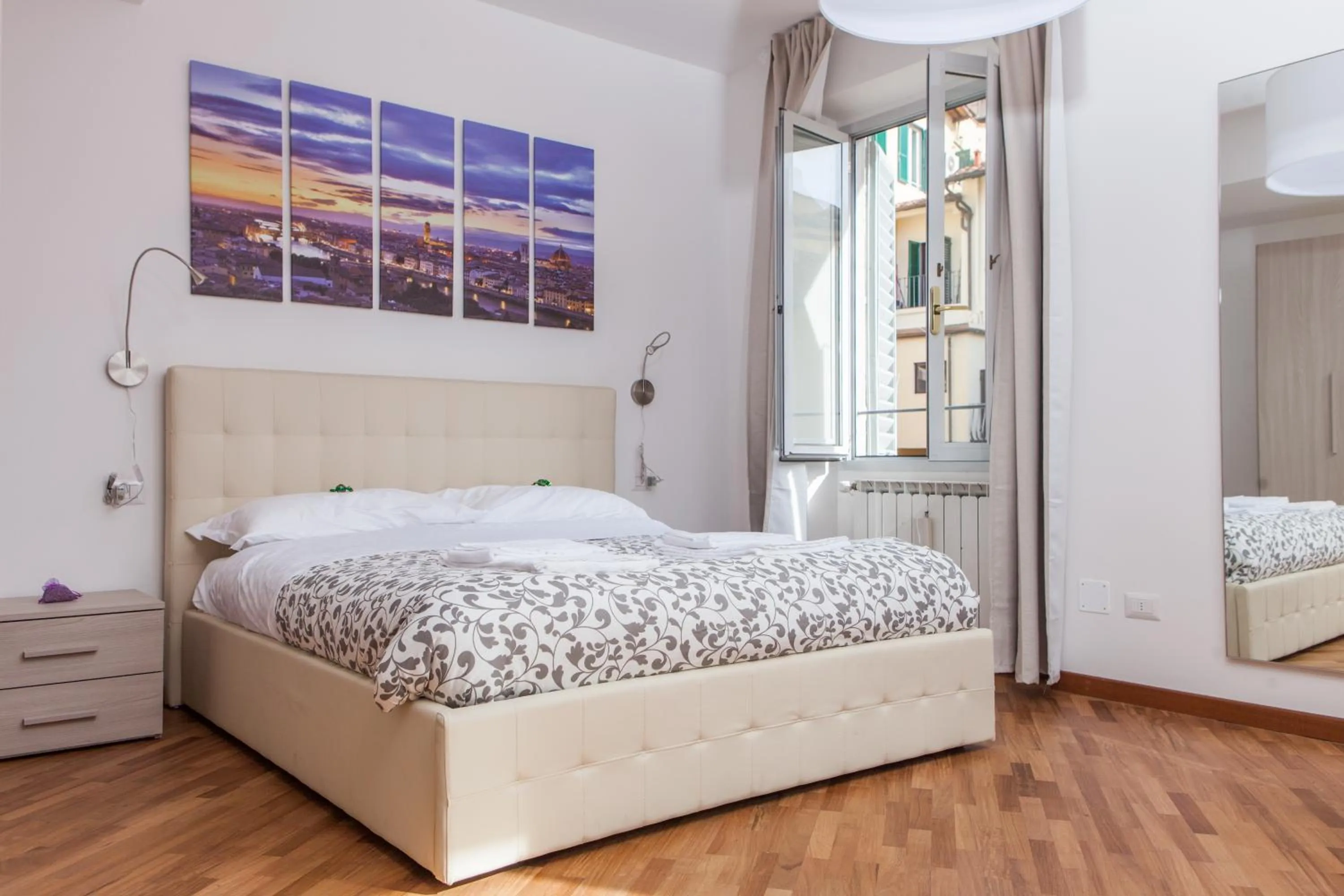 Bed in Le Tre Lune Suites