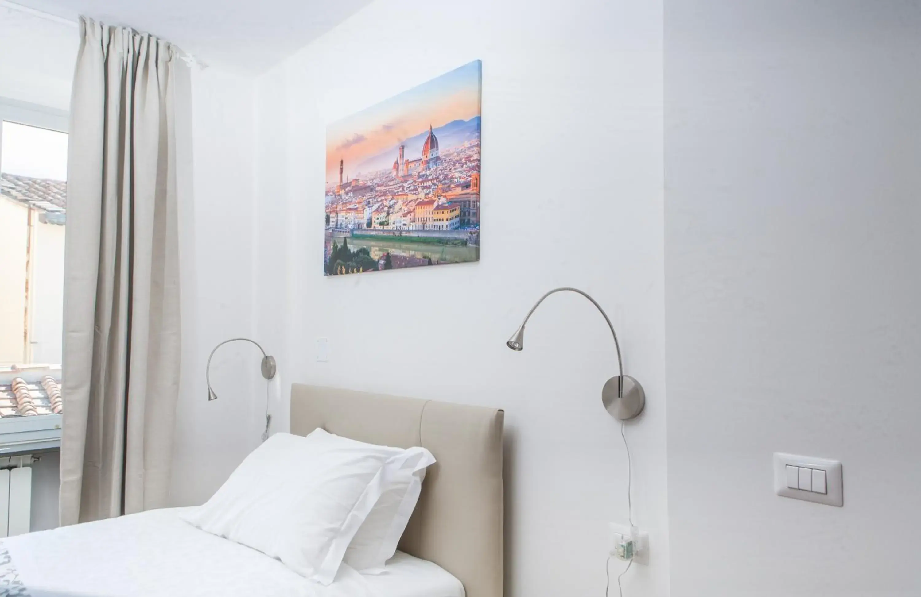 Bed in Le Tre Lune Suites Bed in Le Tre Lune Suites