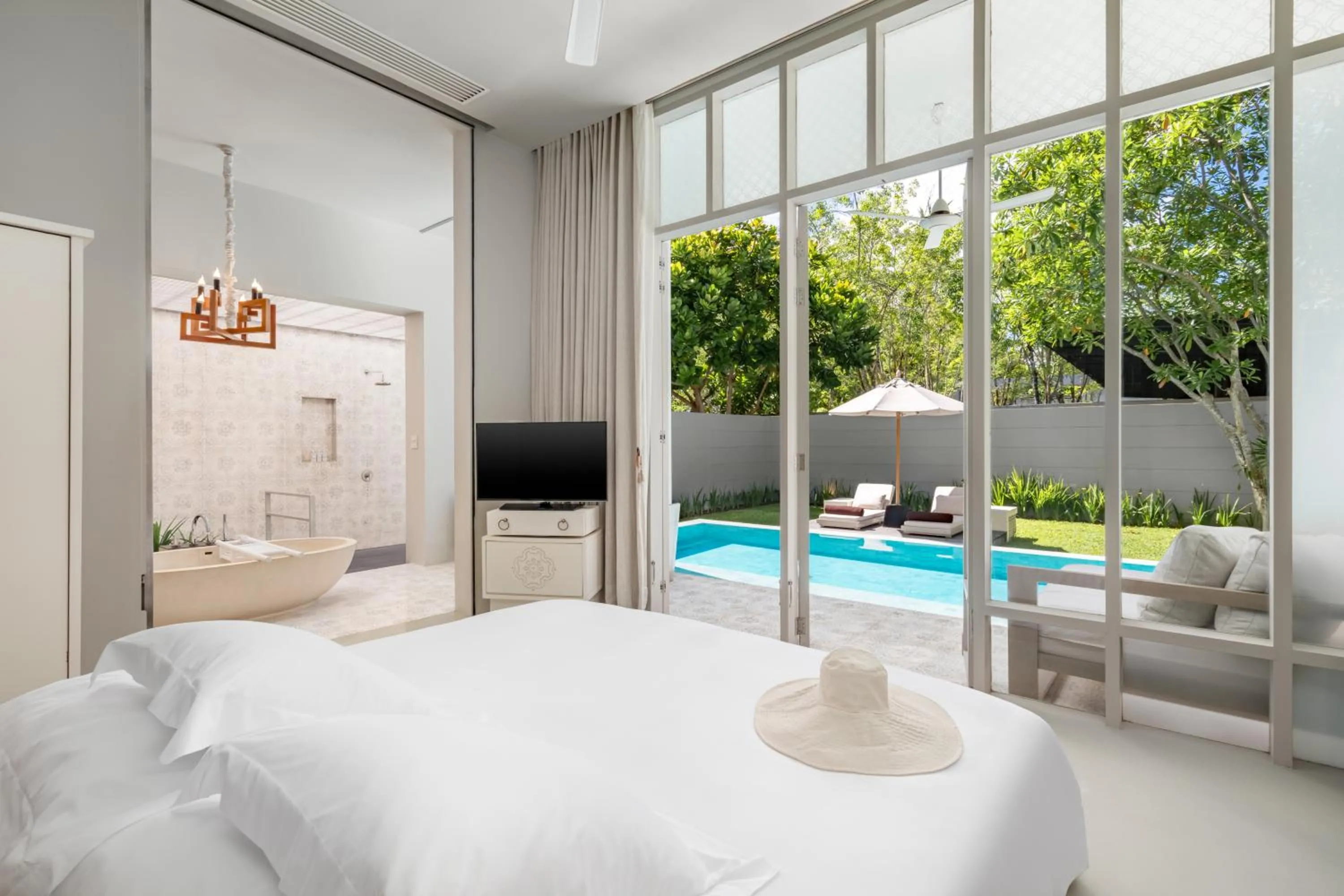 Bed in SALA Phuket Mai Khao Beach Resort