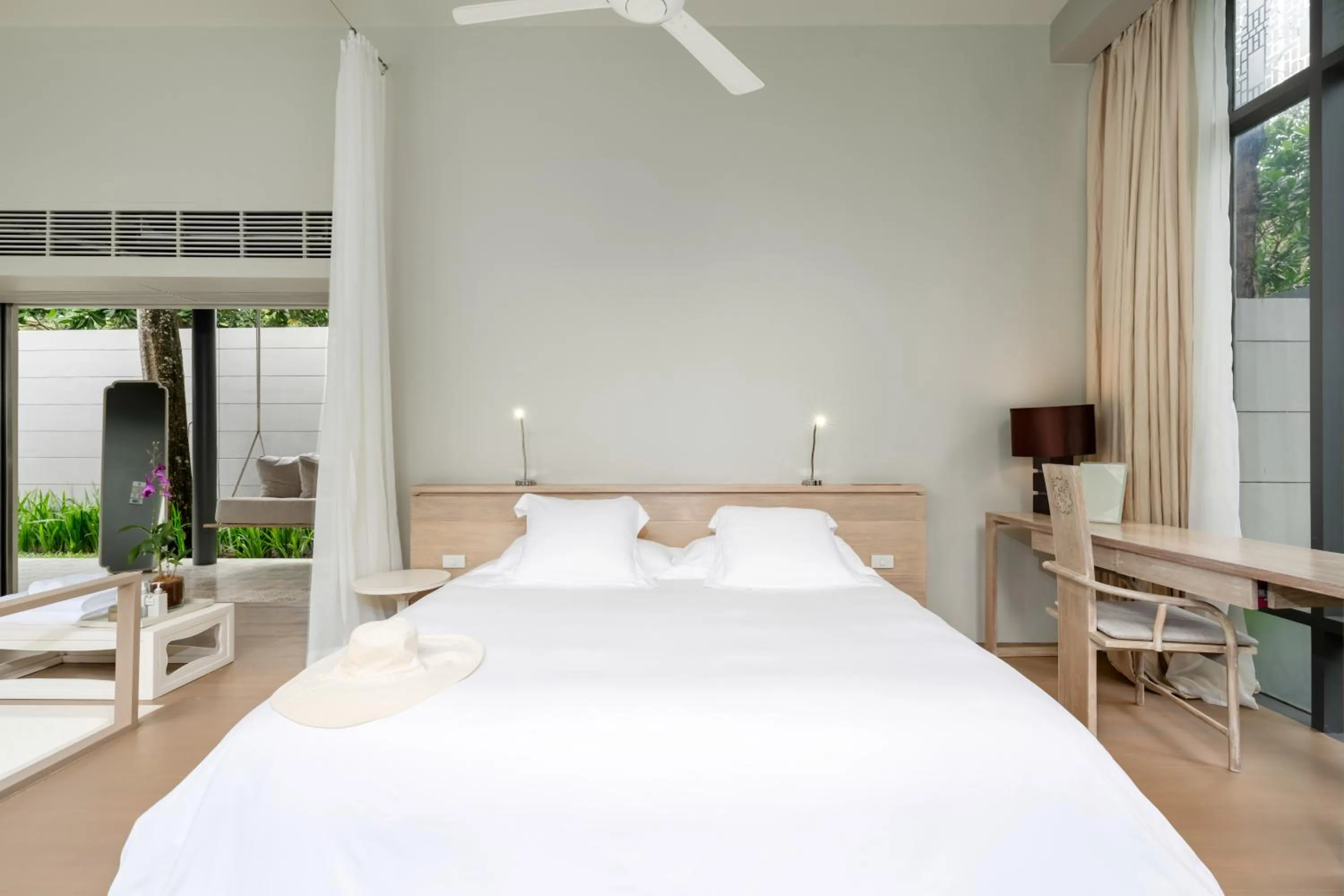 Bed in SALA Phuket Mai Khao Beach Resort