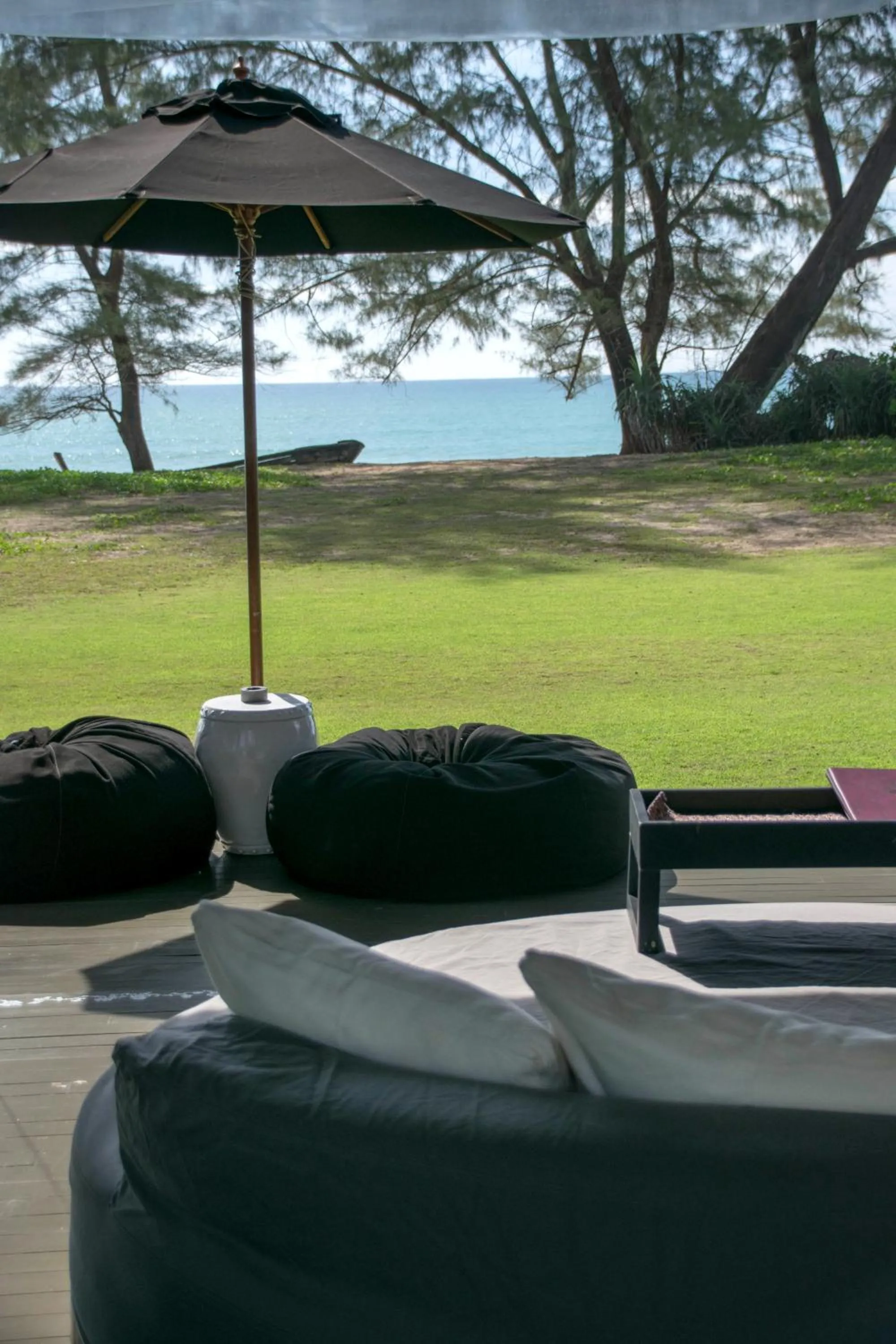 Communal lounge/ TV room in SALA Phuket Mai Khao Beach Resort