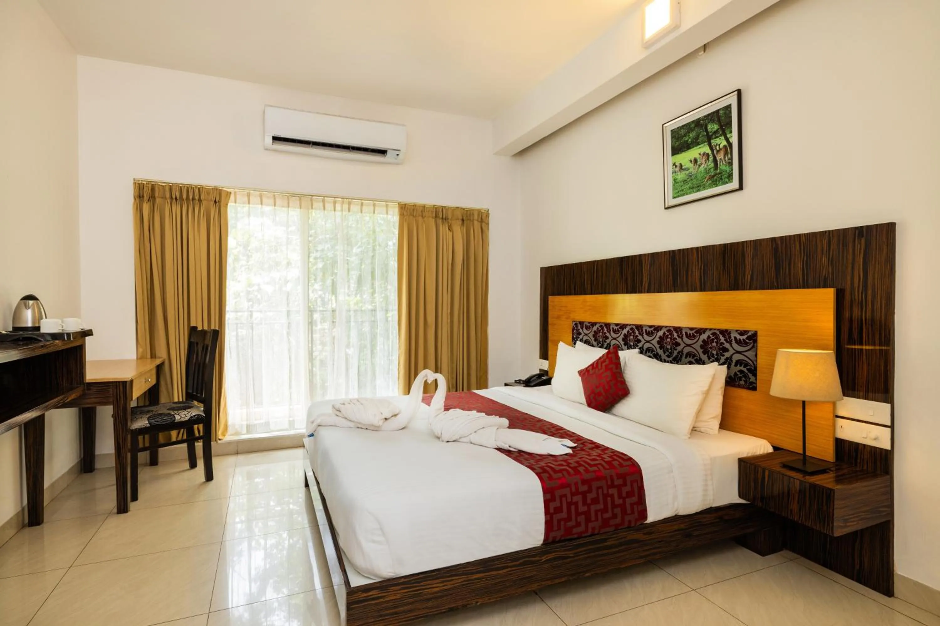Bed in Casa Rio Resorts Athirappilly