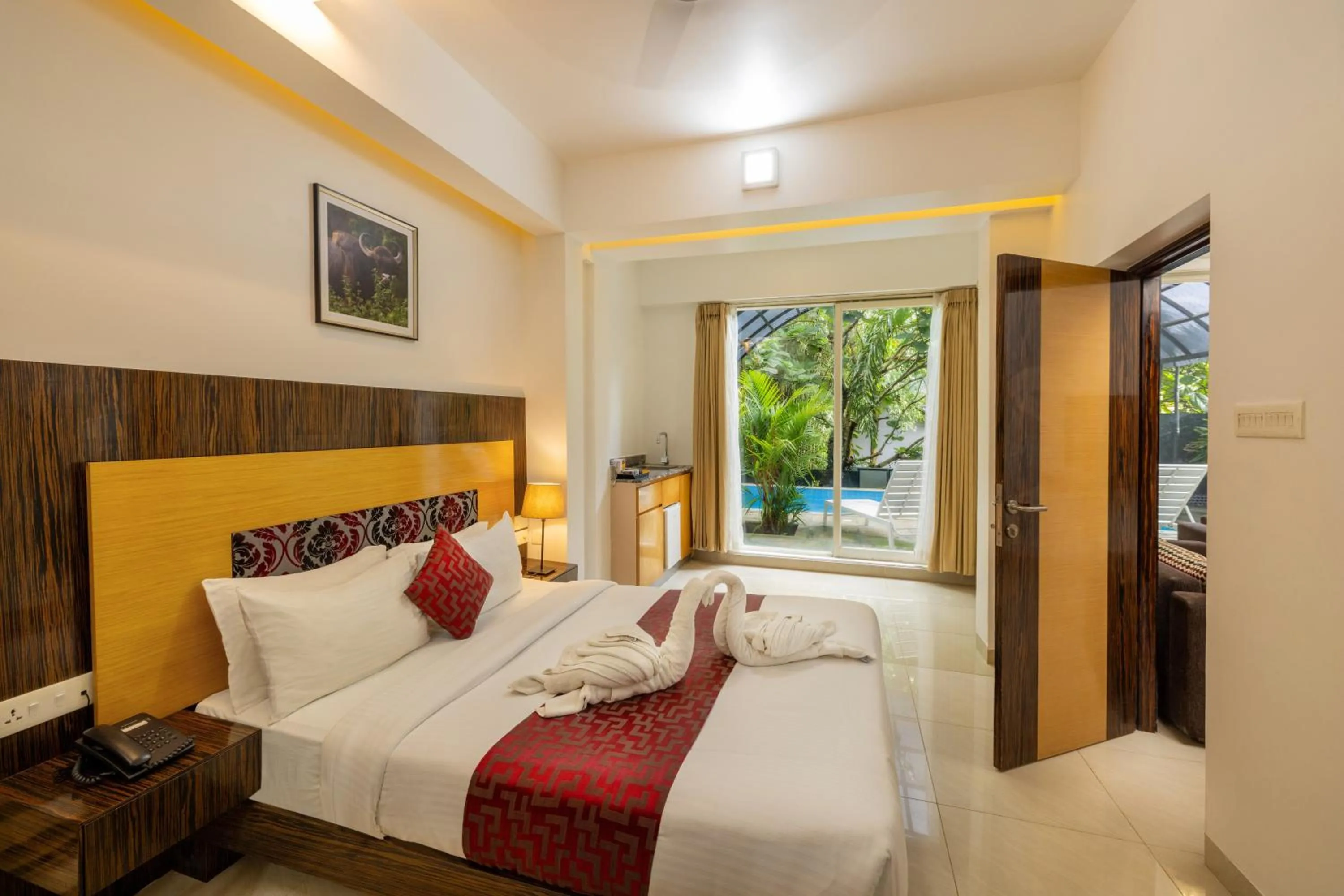 Bed in Casa Rio Resorts Athirappilly