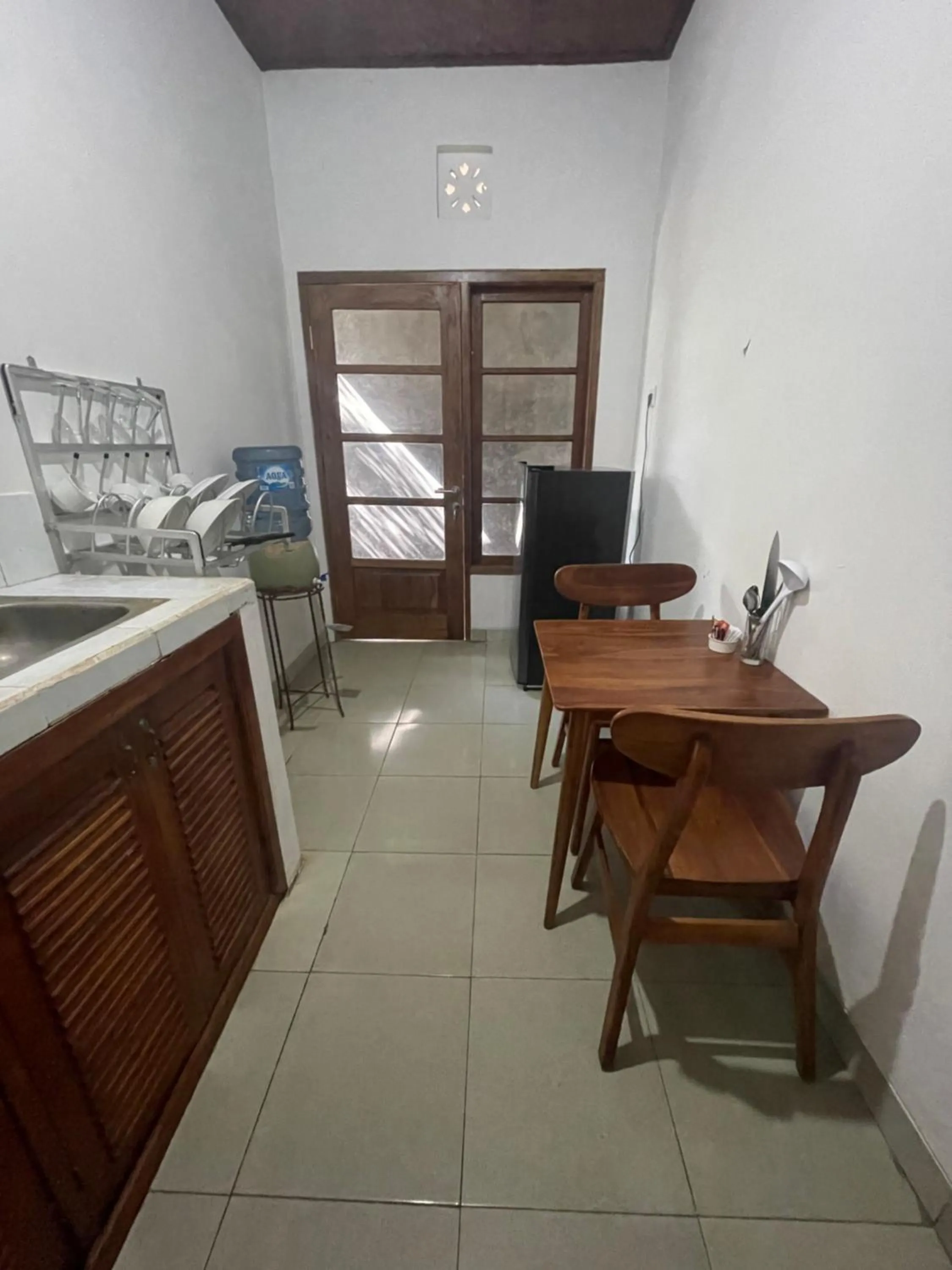 Kitchen or kitchenette in El Homestay Bali