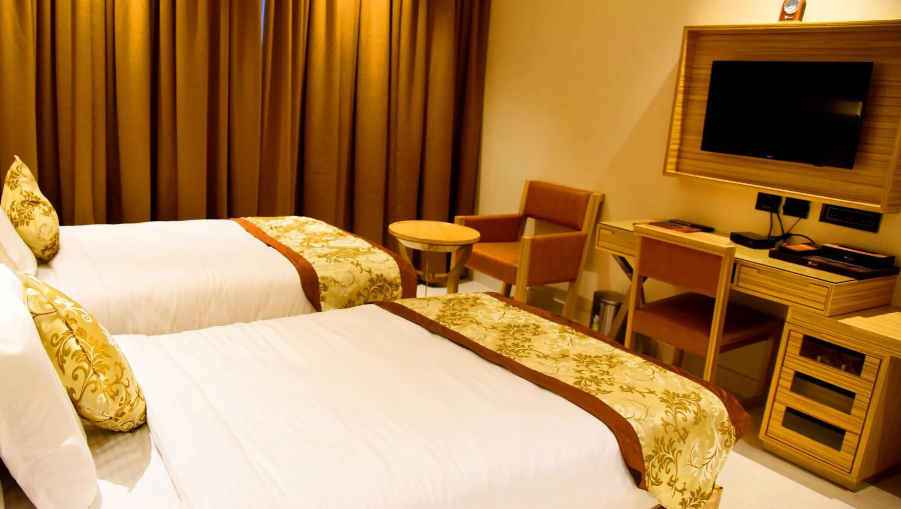 Bedroom, Bed in Mango Hotels Vijayawada