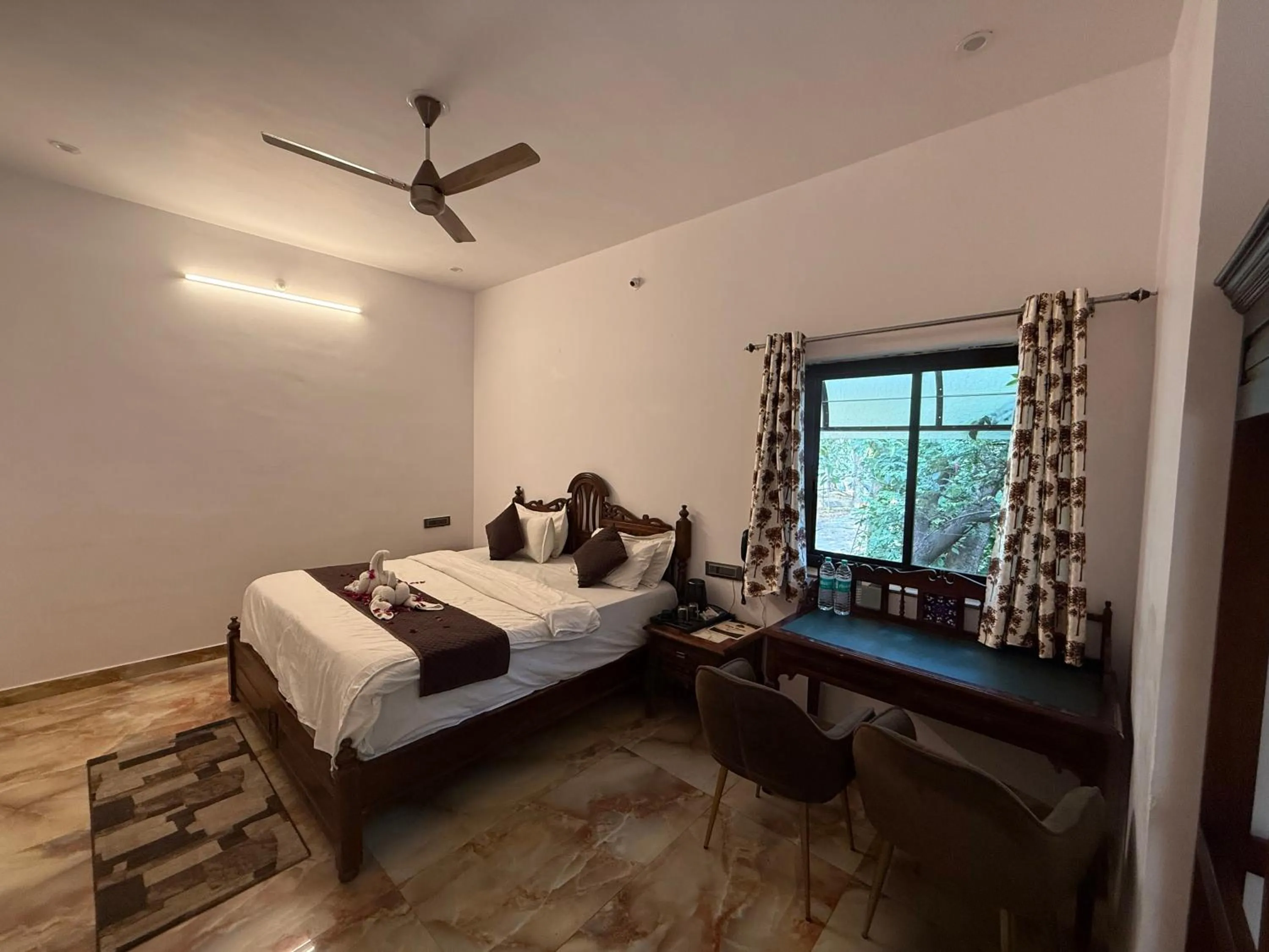 Bed in Hotel Green Heaven Resort