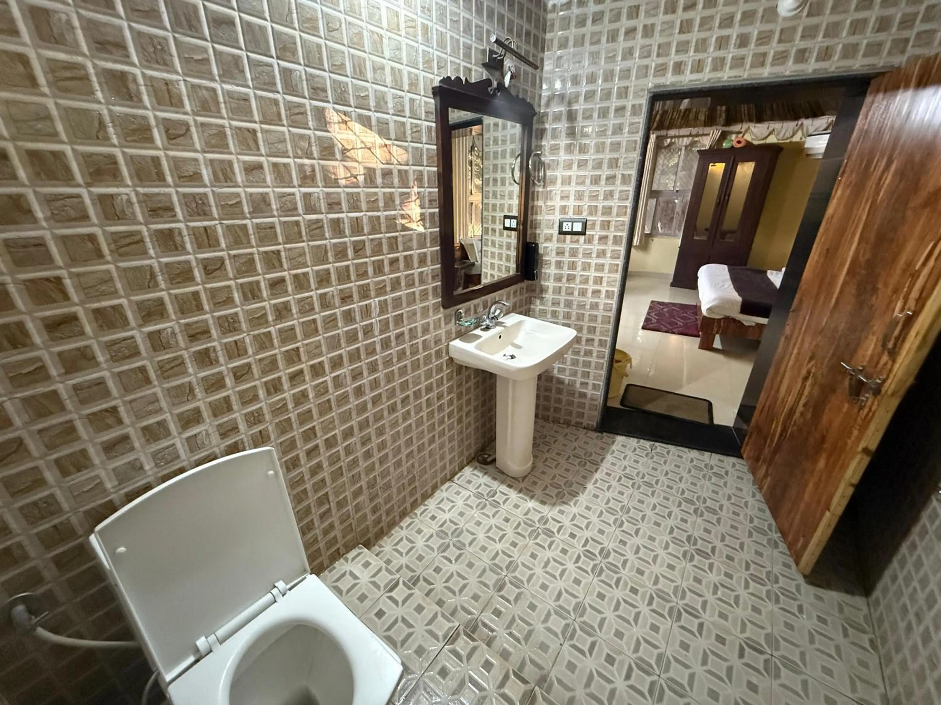 Bathroom in Hotel Green Heaven Resort