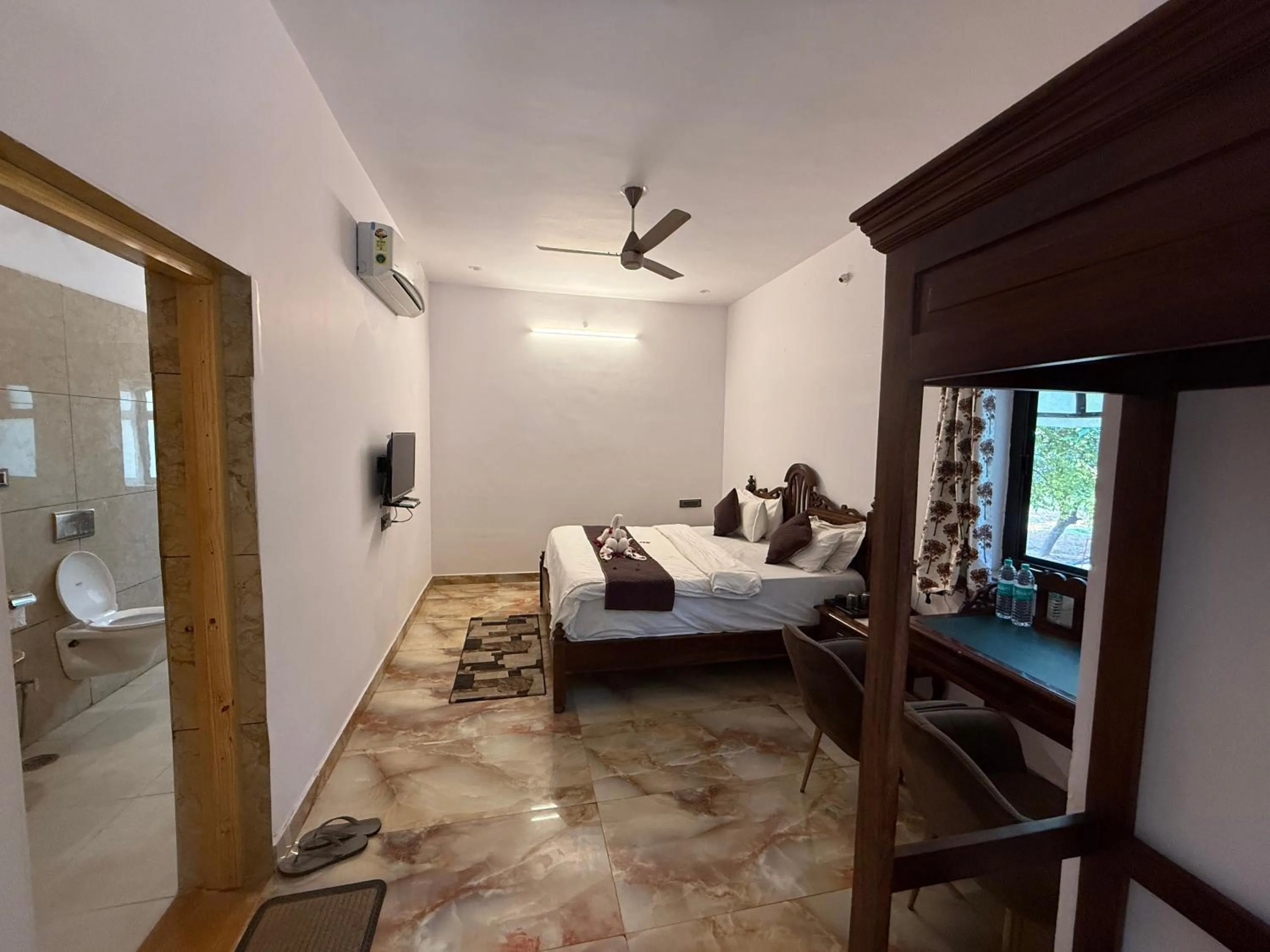 Bed in Hotel Green Heaven Resort