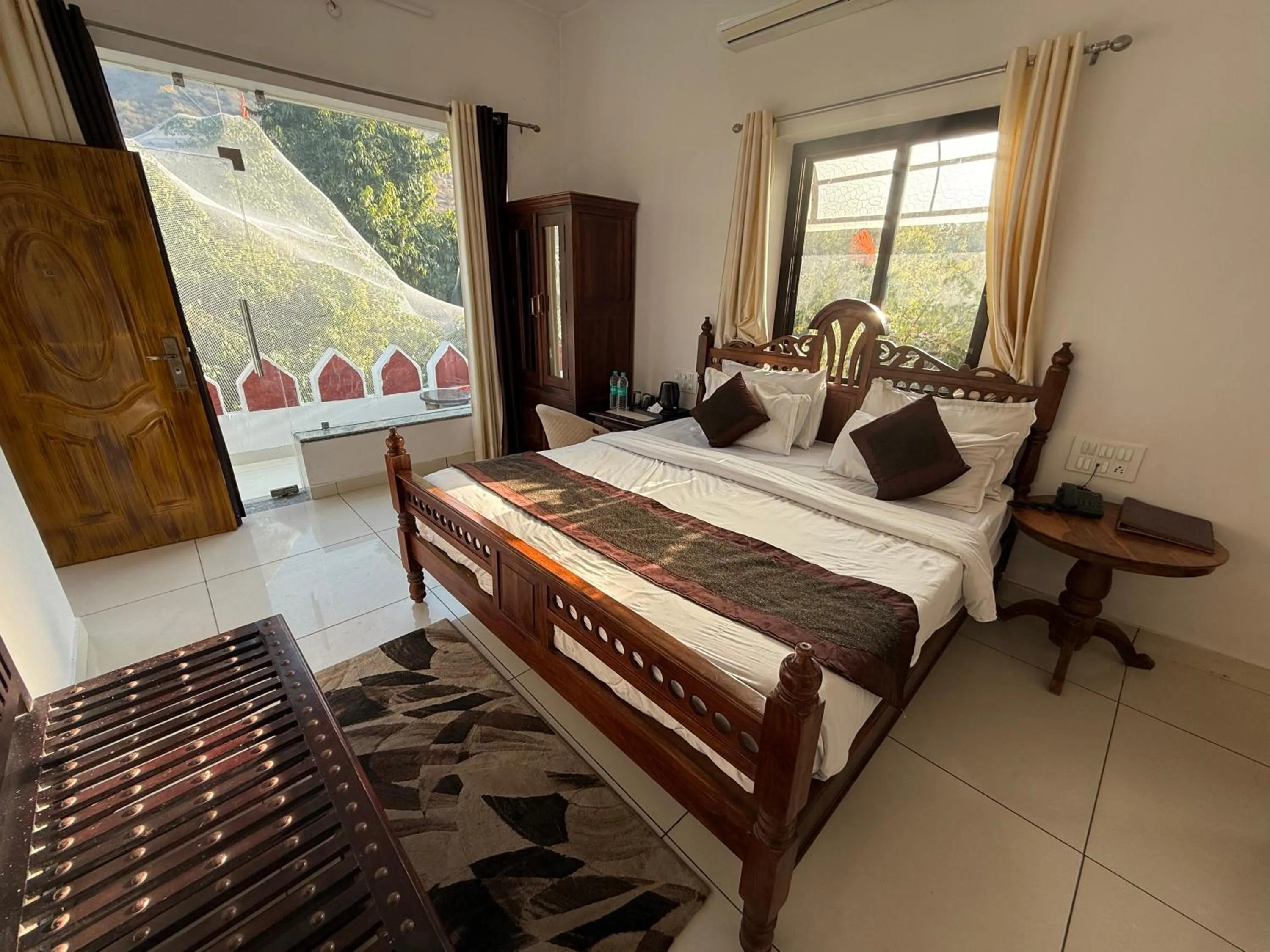 Bed in Hotel Green Heaven Resort