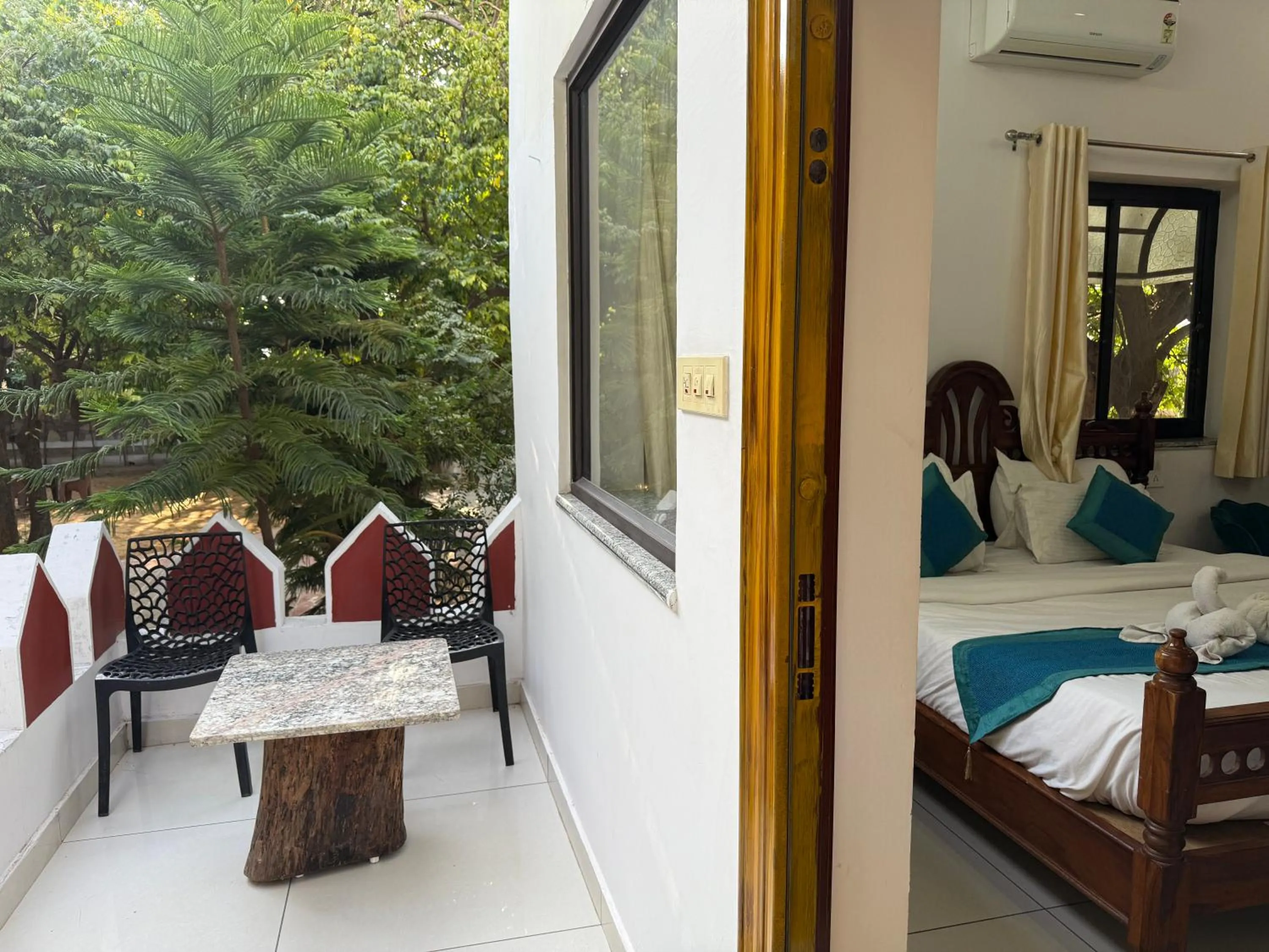 Bed in Hotel Green Heaven Resort